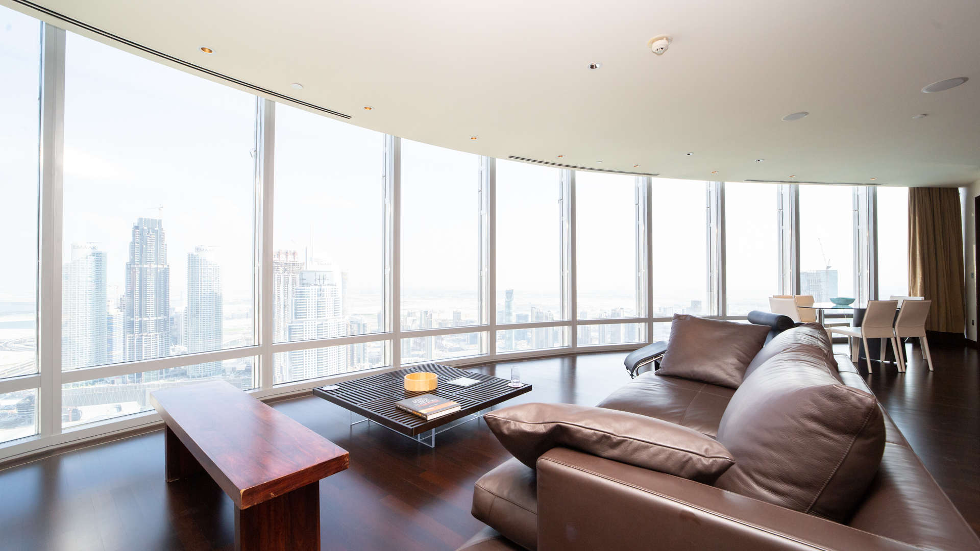 Luxurious living room in Burj Khalifa apartment, Downtown Dubai, featuring modern furniture and views