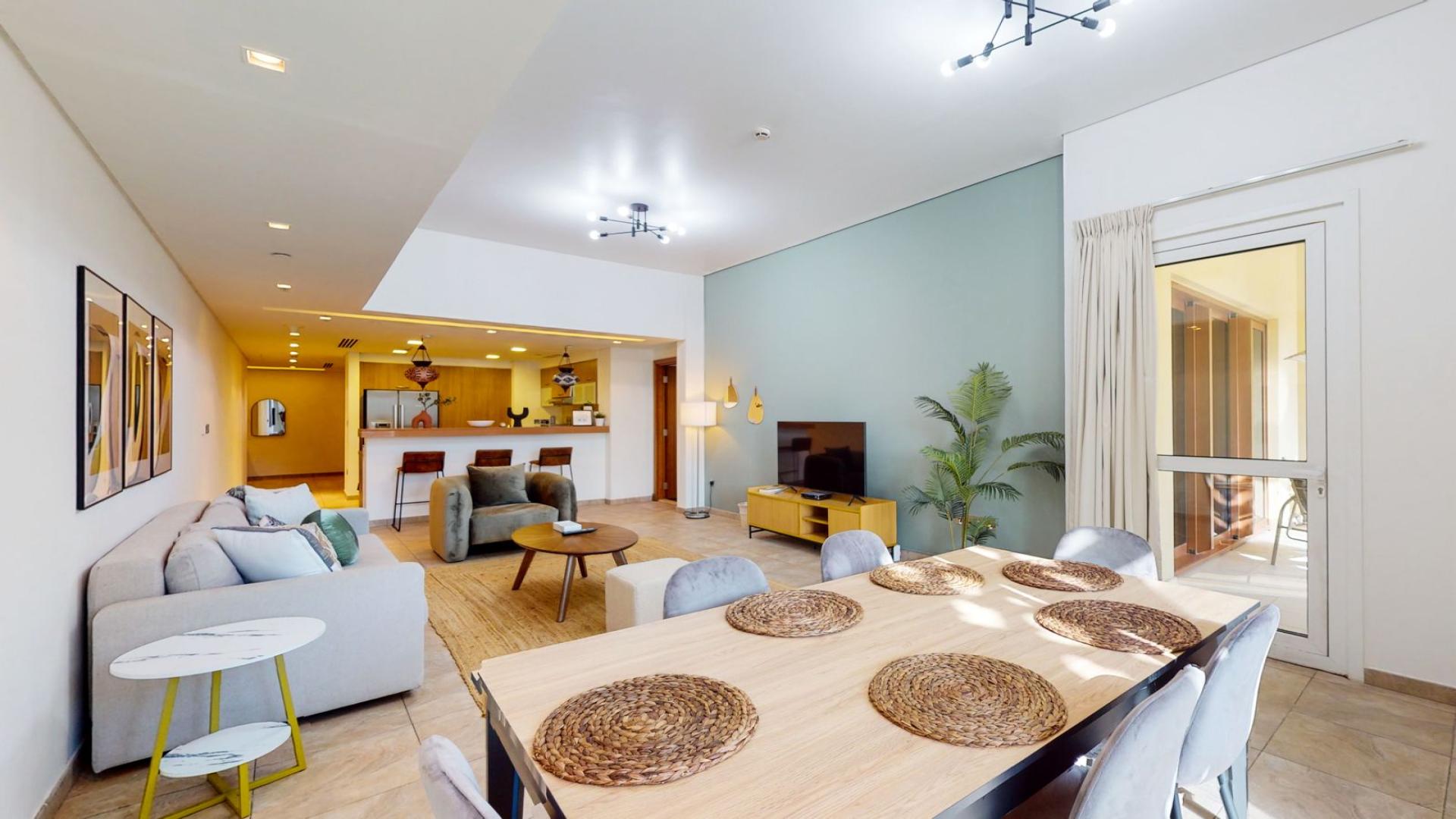 Modern living room in Marina Residences apartment, Palm Jumeirah, with stylish decor and open layout