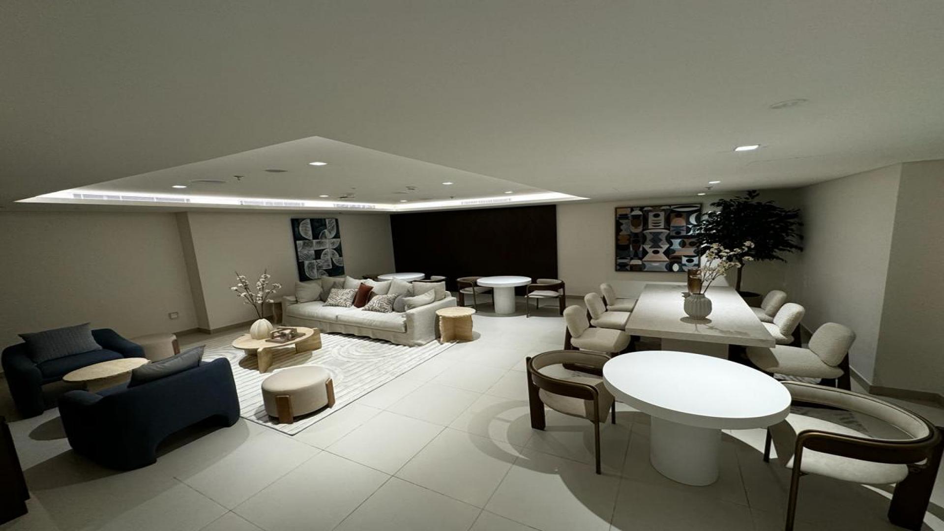 Balcony view from luxury 2-bedroom apartment in Dubai Creek Harbour, overlooking the waterfront