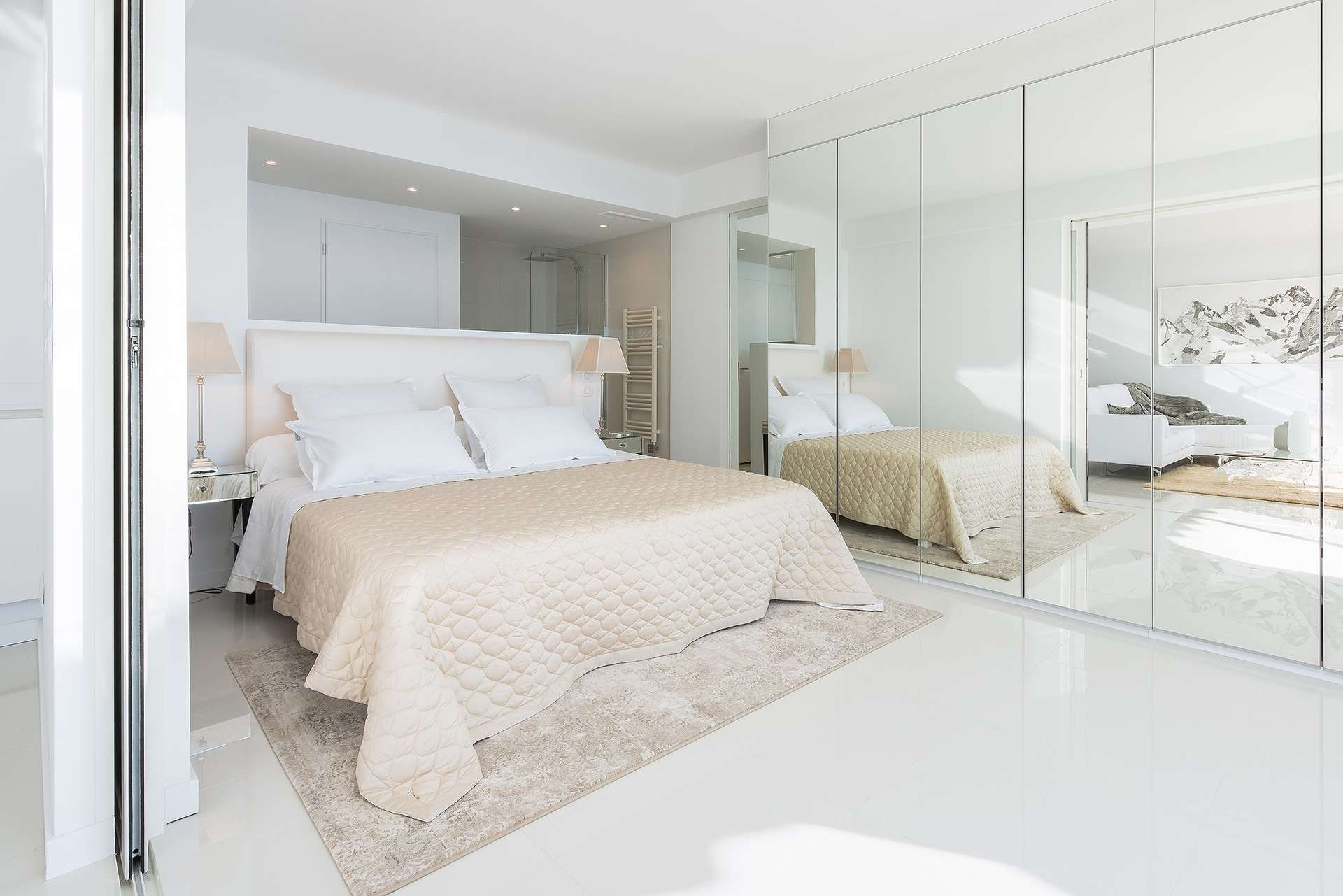 Luxurious bedroom in stylish 2-bedroom apartment, Cannes, French Riviera, with mirrored wardrobe