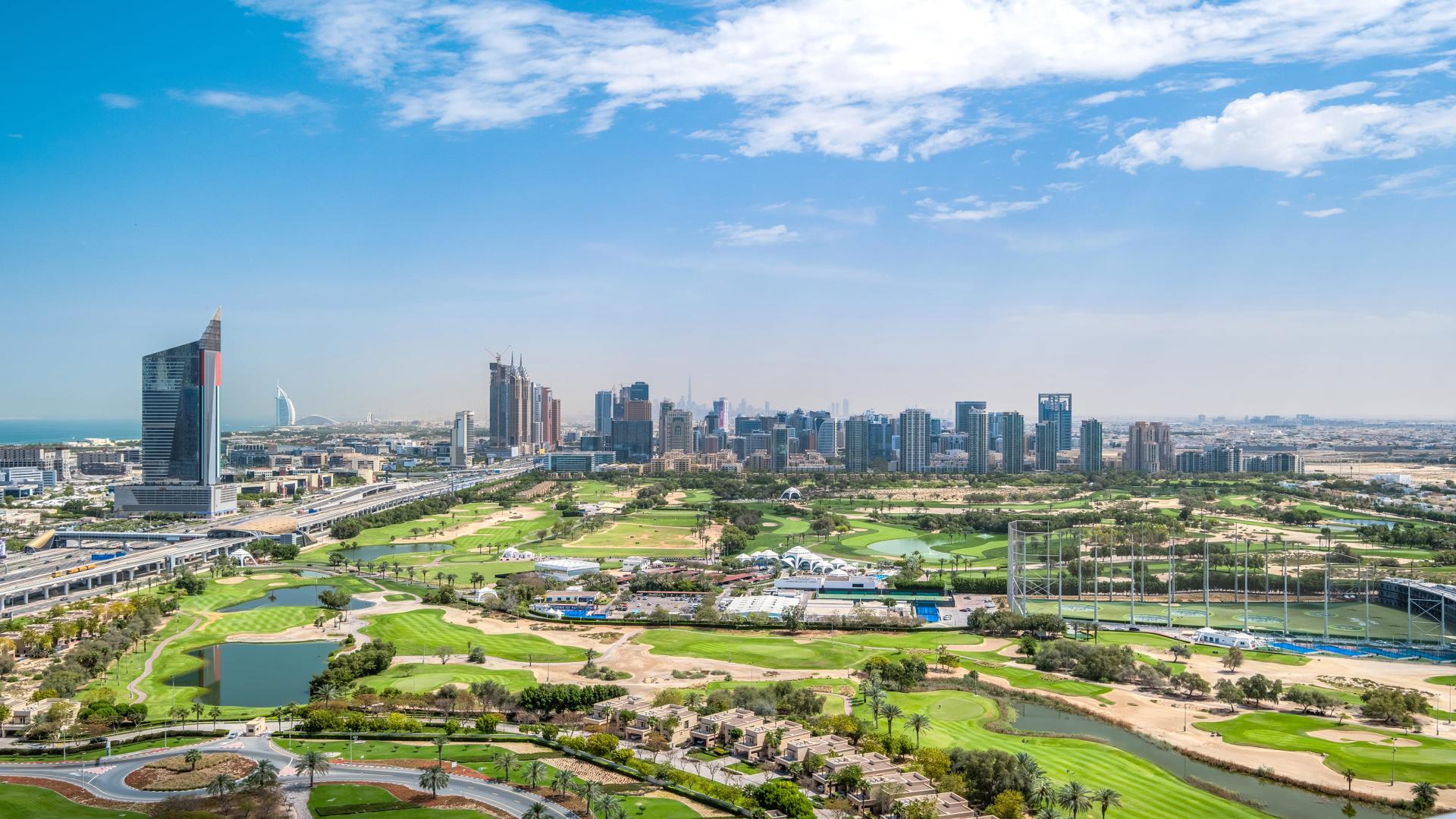 Luxurious living room in Jumeirah Lake Towers apartment with modern decor and open layout