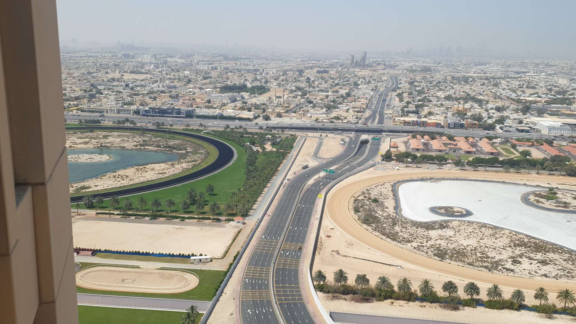 Living room in Churchill Tower apartment with modern decor and balcony sea view