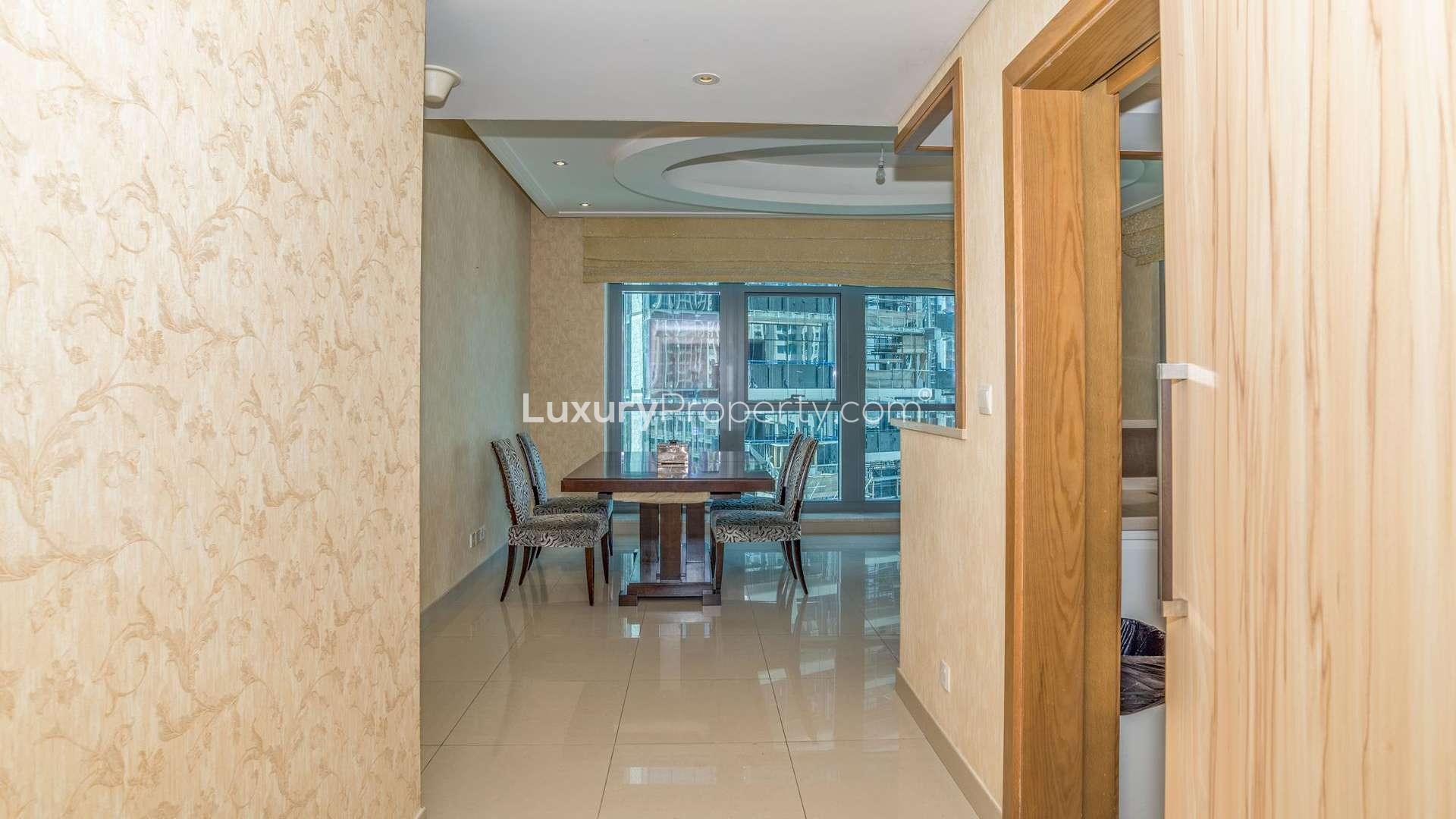Luxurious bedroom in Claren Tower apartment, Downtown Dubai with elegant decor and city view