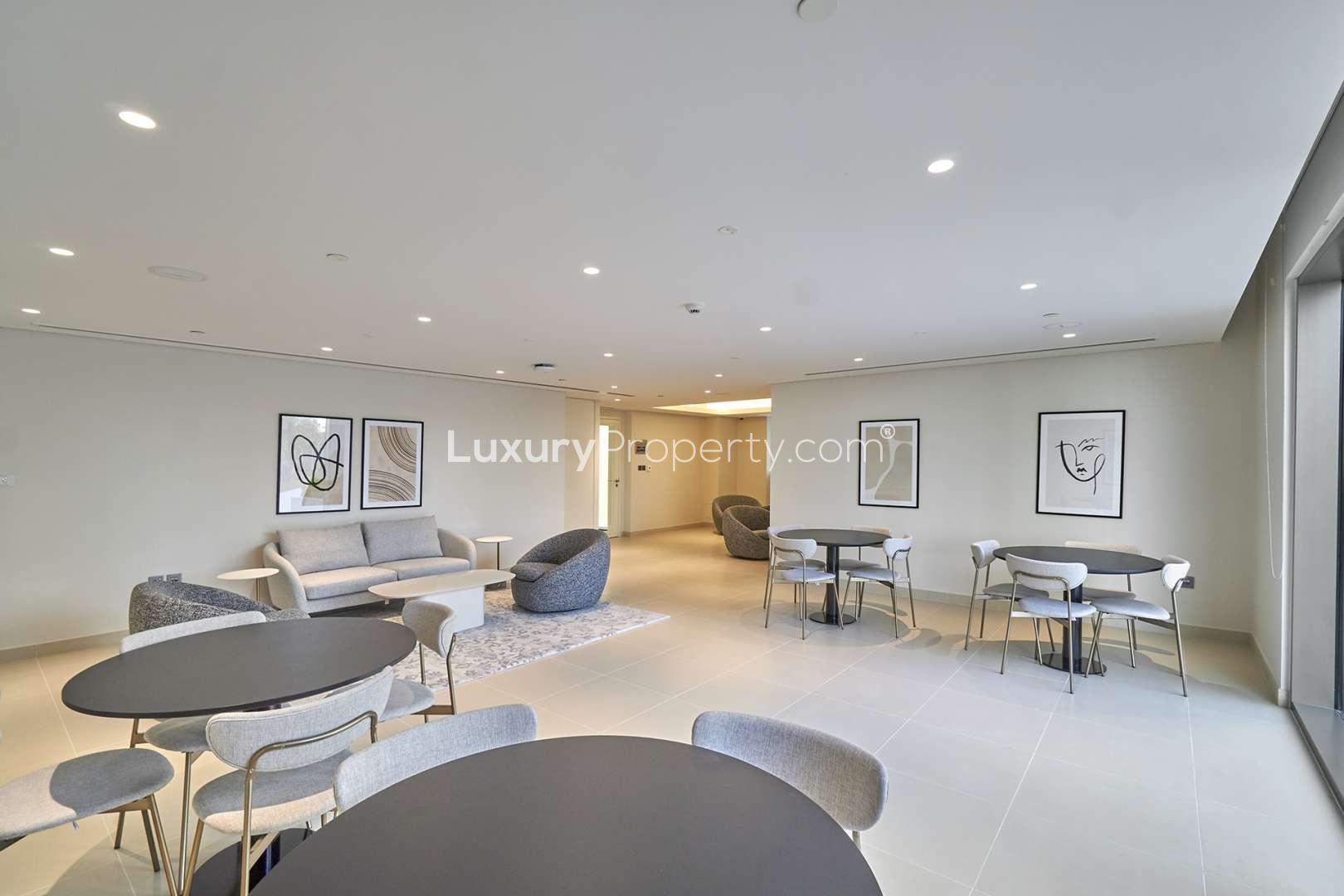 Modern living room in Creekside 18 apartment, Dubai Creek Harbour, featuring stylish seating area