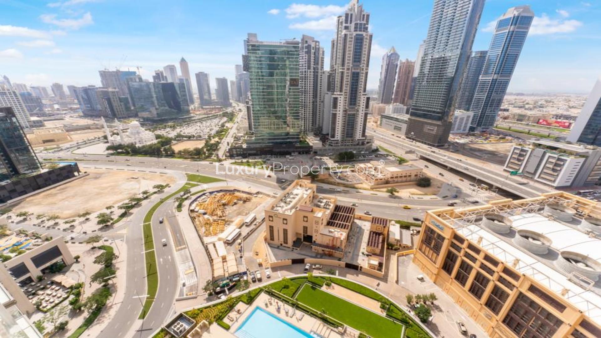 Modern furnished living room with city view in Burj Crown apartment, Downtown Dubai