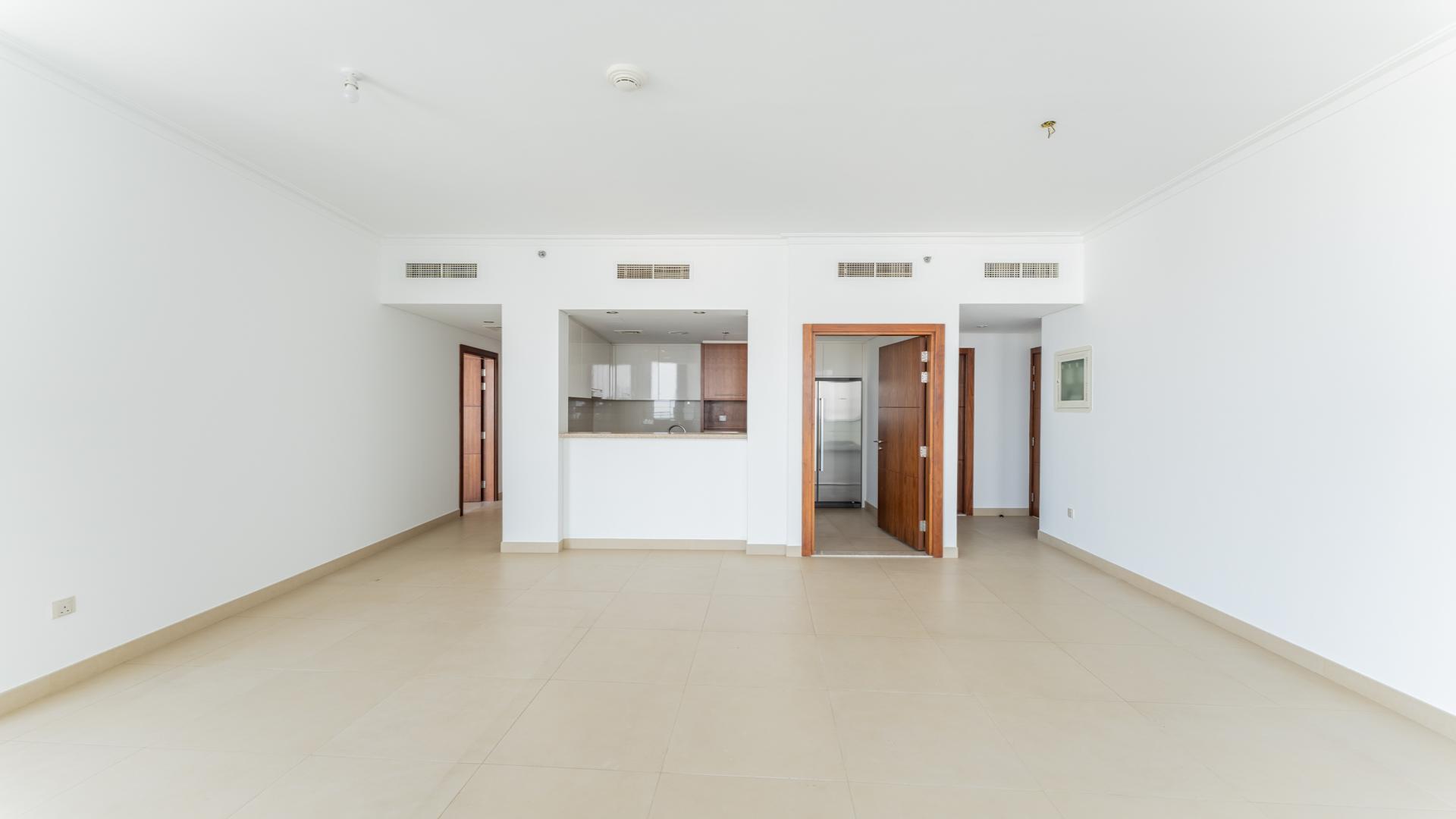 Spacious living room in 2-bedroom apartment, Burj Vista, Downtown Dubai with large windows and view