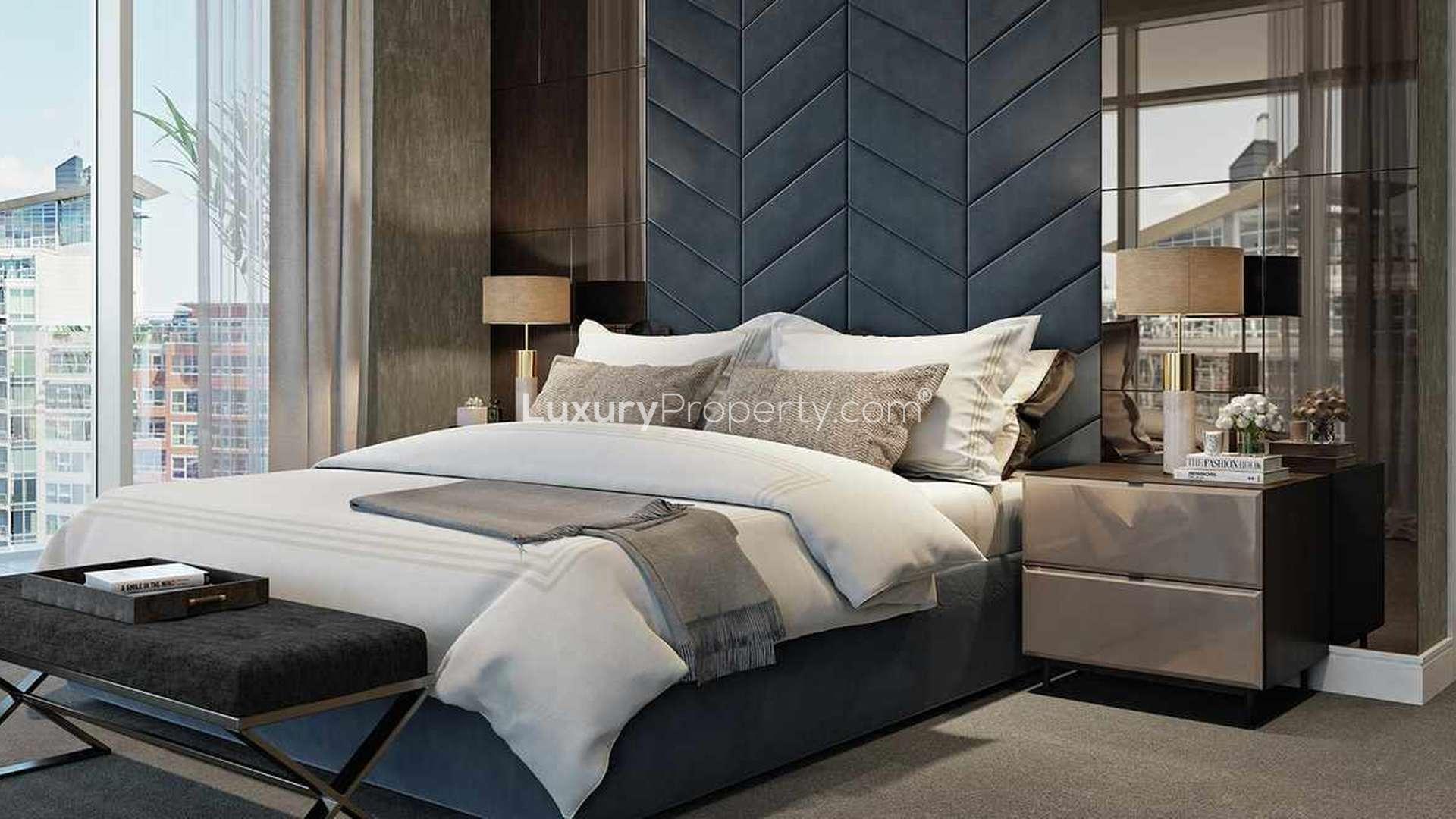Luxurious bedroom in two-bedroom apartment, Discovery House, Battersea Reach, with modern decor