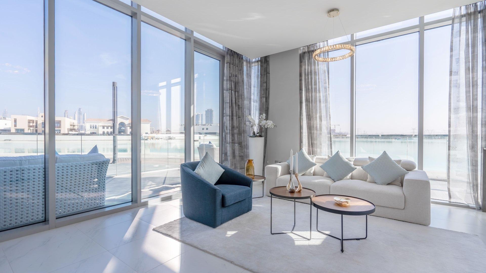 Modern living room with lagoon views in District One apartment, Mohammed Bin Rashid City