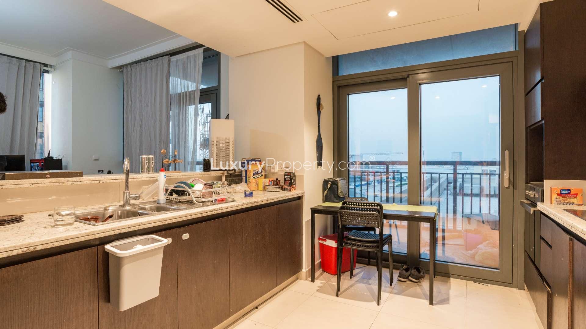 Spacious living and dining area in Dubai Creek Residences North Tower 3 apartment