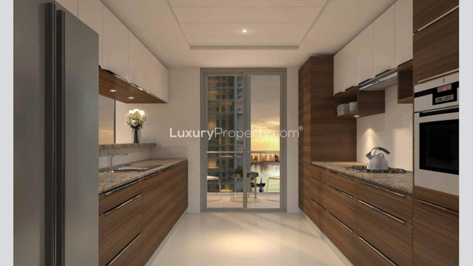 Luxury waterfront apartment view at Dubai Creek Residences with marina and yachts