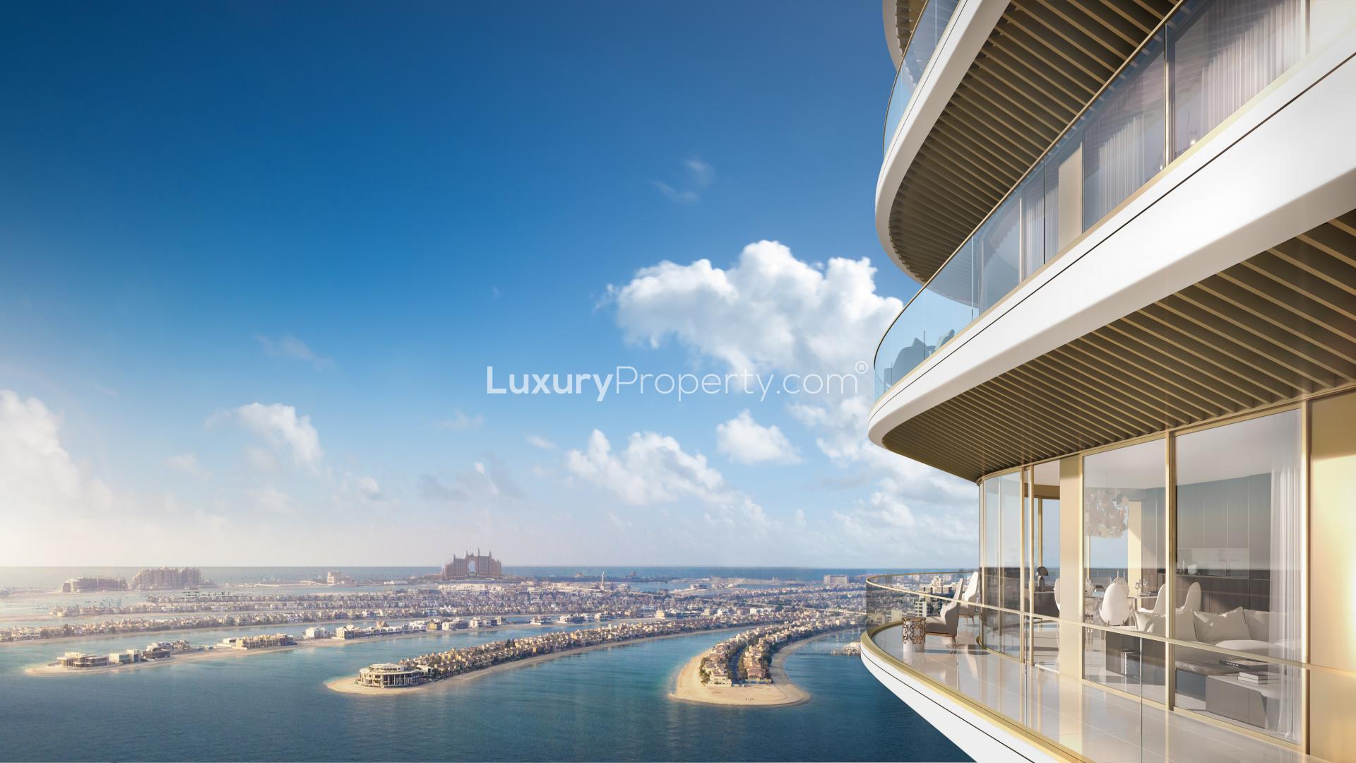Luxury Grand Bleu Tower exterior at Emaar Beachfront, Dubai Harbour, sunny sky background