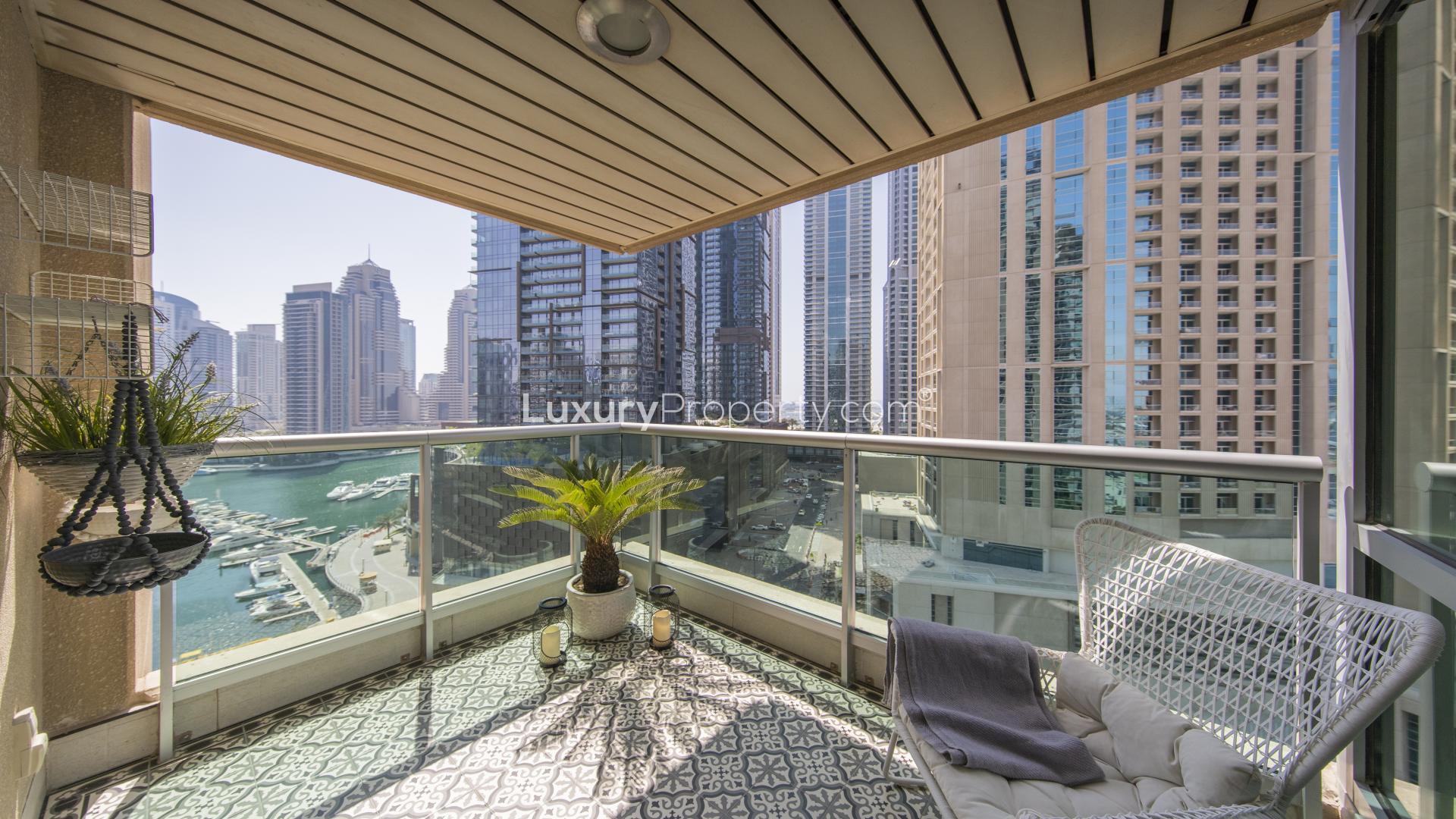 Fully upgraded living room in Dubai Marina apartment, featuring elegant decor and natural light