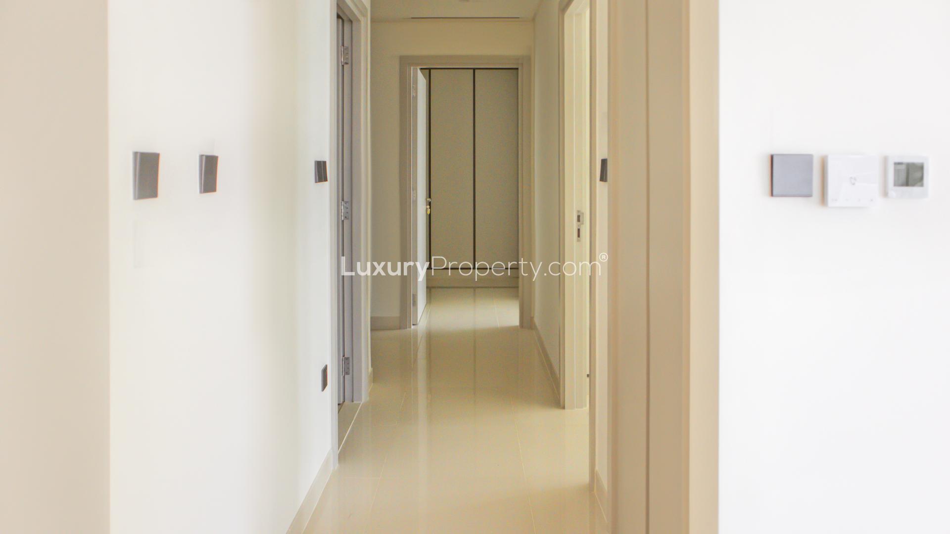 Bright hallway in Emaar Beachfront apartment, Dubai Harbour, featuring modern design and sleek finishes