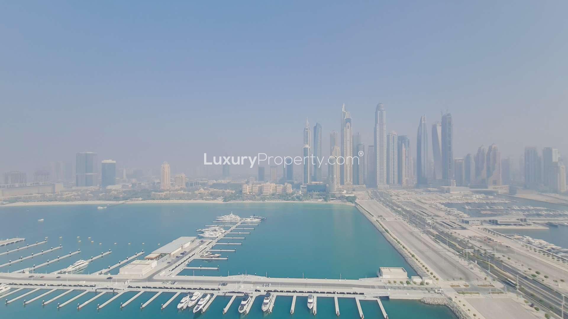 N/A,Penthouse apartment view of Dubai Marina skyline and waterfront at Emaar Beachfront, Dubai Harbour