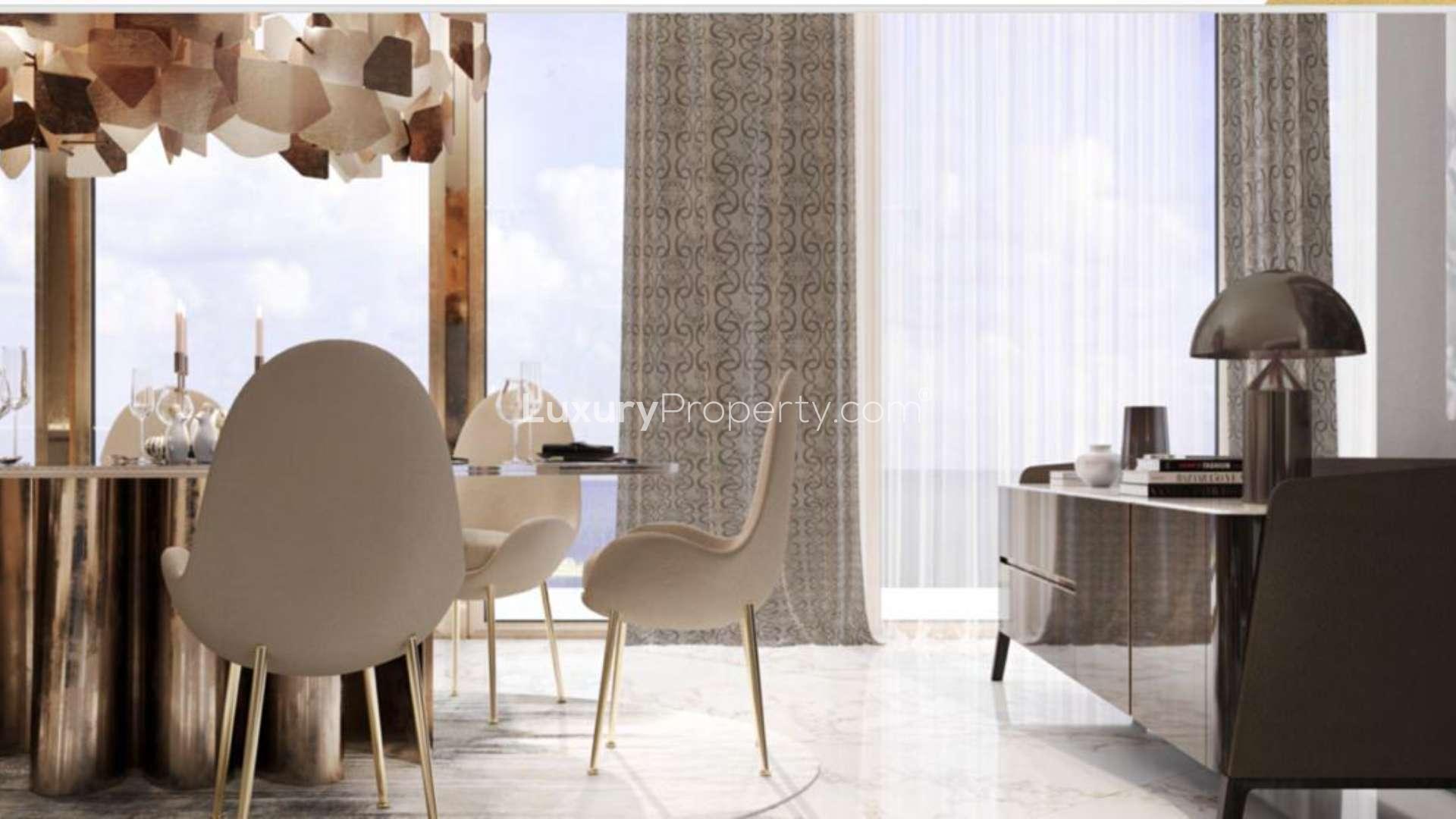 Outdoor pool with sea view at Elie Saab Tower, Emaar Beachfront, Dubai Harbour