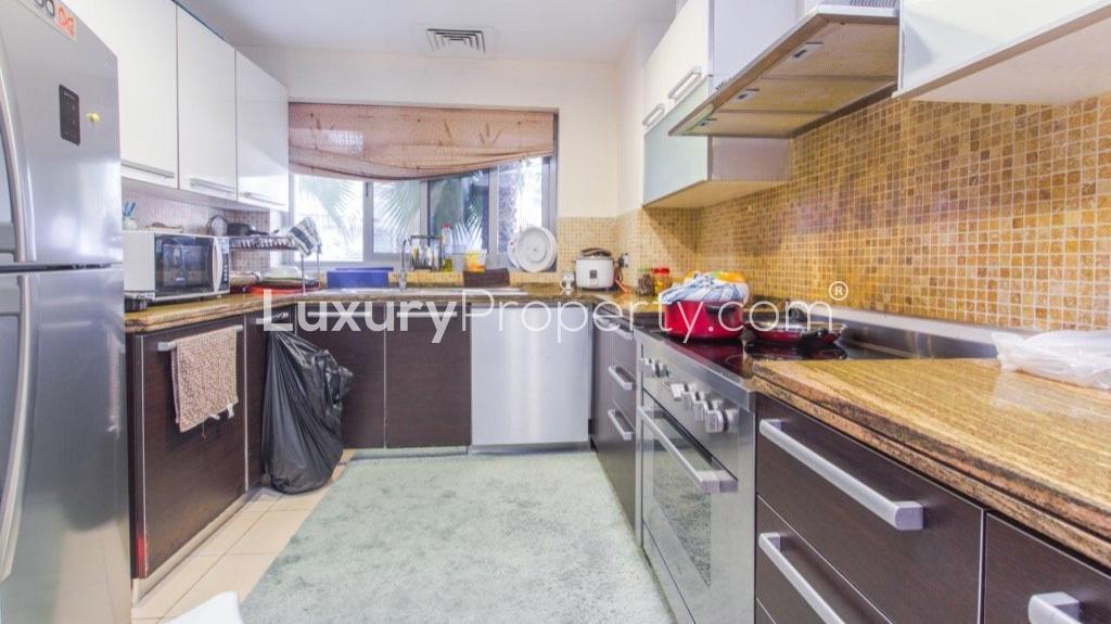 Elegant dining area in two-bedroom villa, Executive Towers, Business Bay. Luxurious interior design