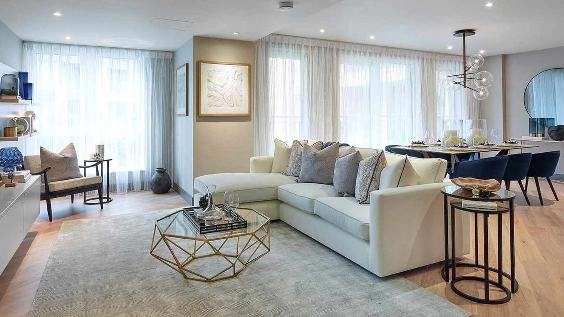 Elegant living room in Chelsea Creek apartment with modern furnishings and natural light