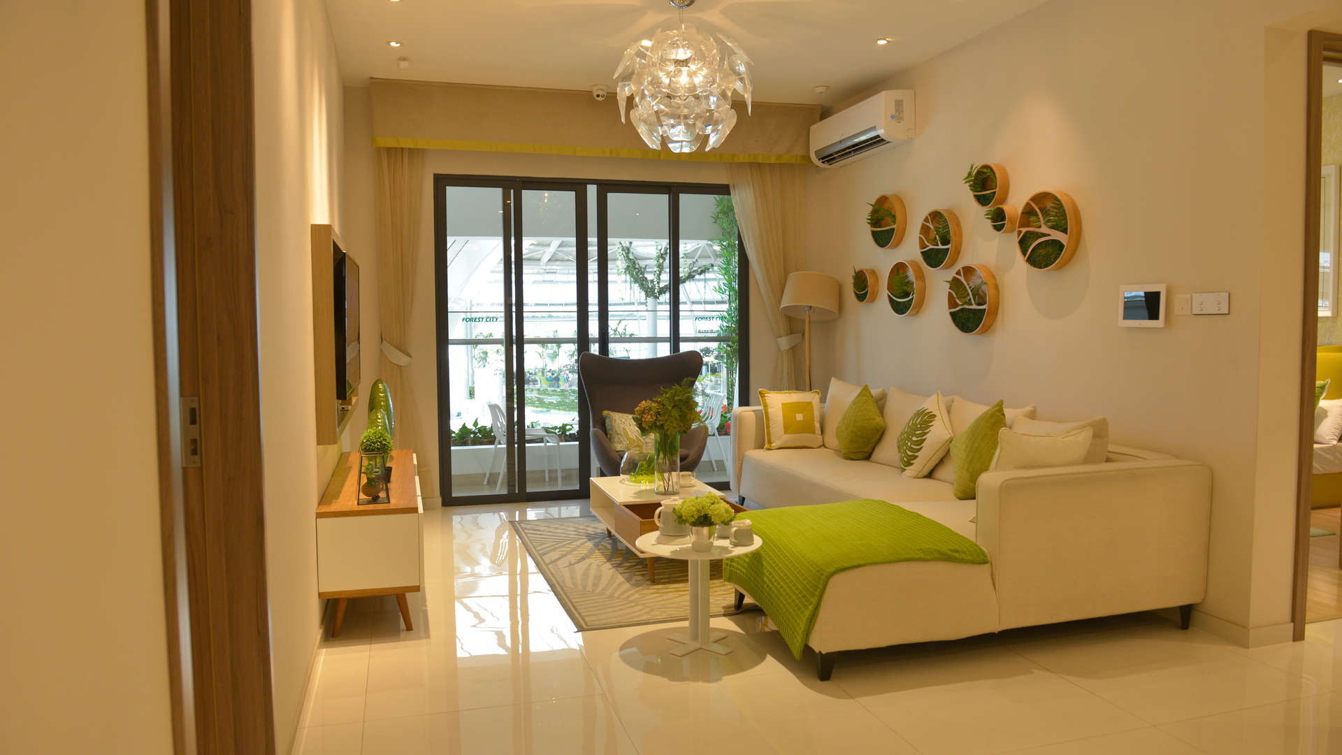 Luxurious waterfront apartments in Forest City, Malaysia, with stunning sunset views