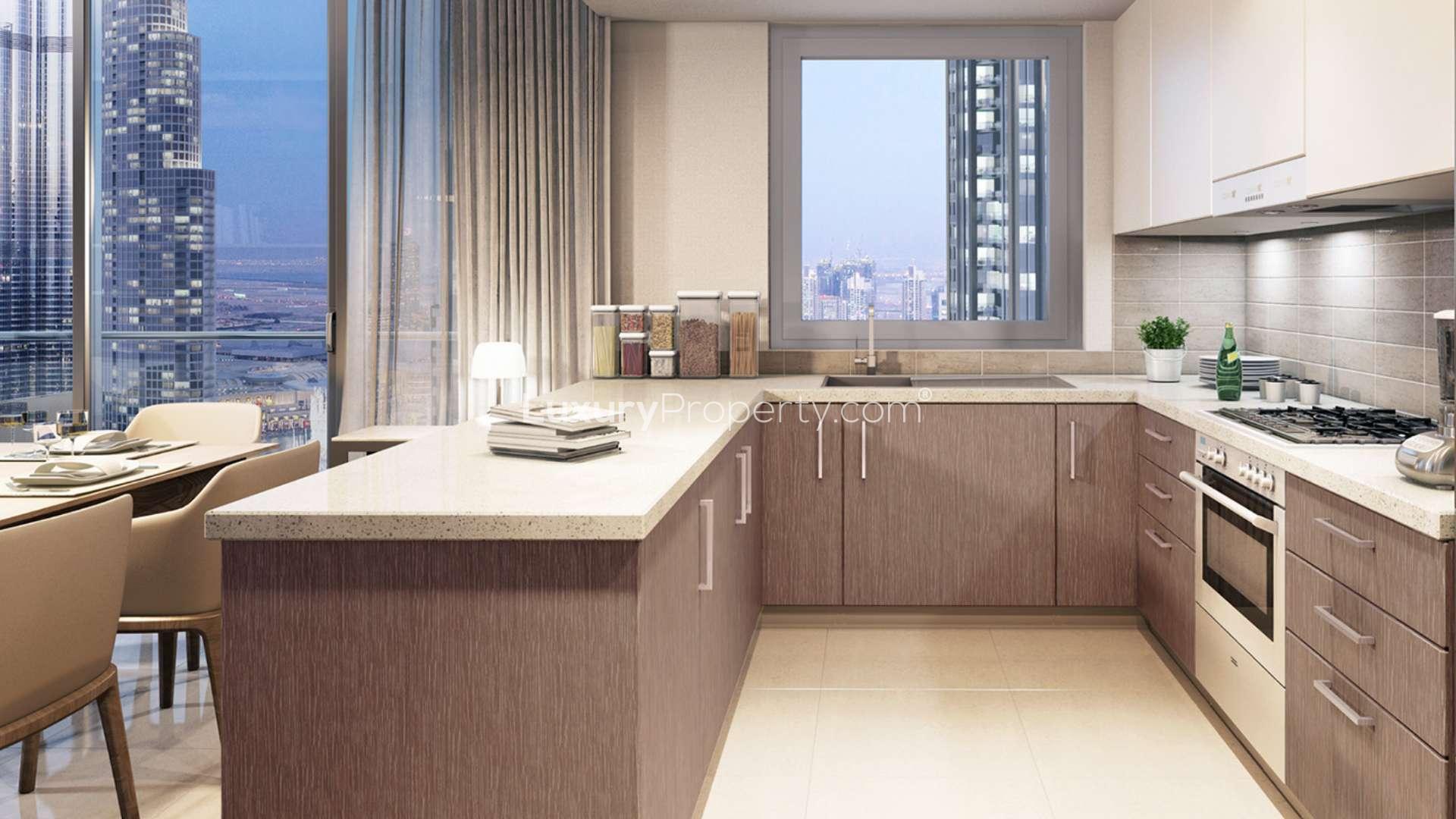 Luxurious Downtown Dubai apartment view, featuring cityscape and waterfront from Forte balcony