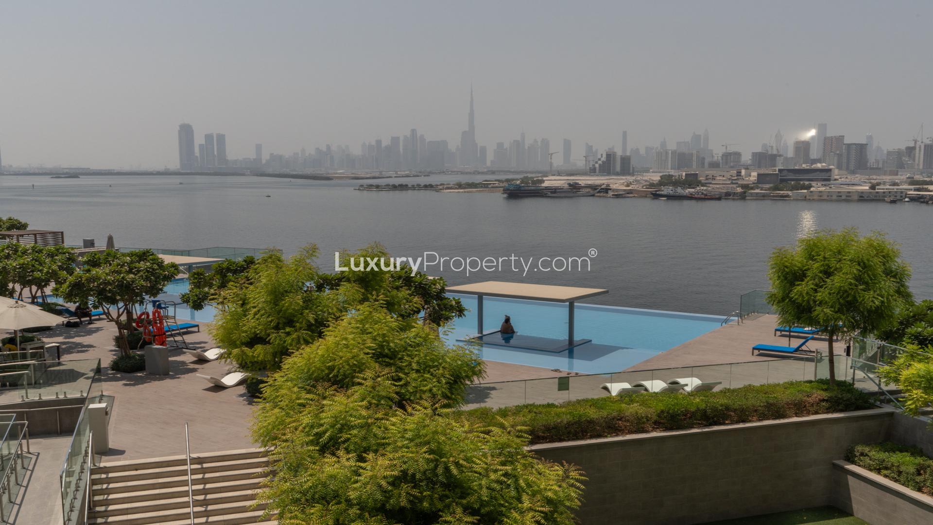 Dubai Creek Harbour apartment balcony view overlooking waterfront and skyline at The Grand