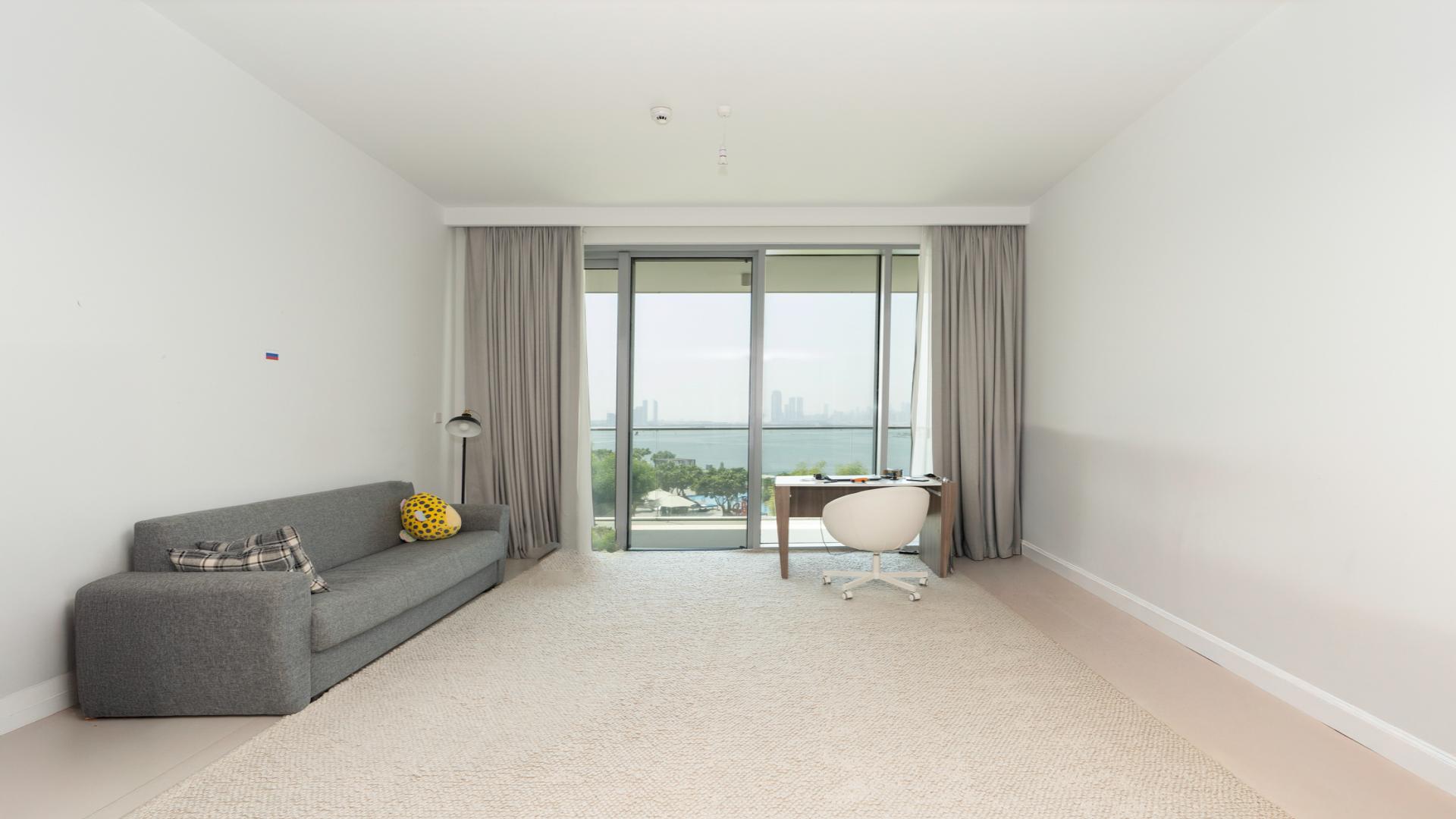 Modern kitchen and dining area in Dubai Creek Harbour apartment, The Grand