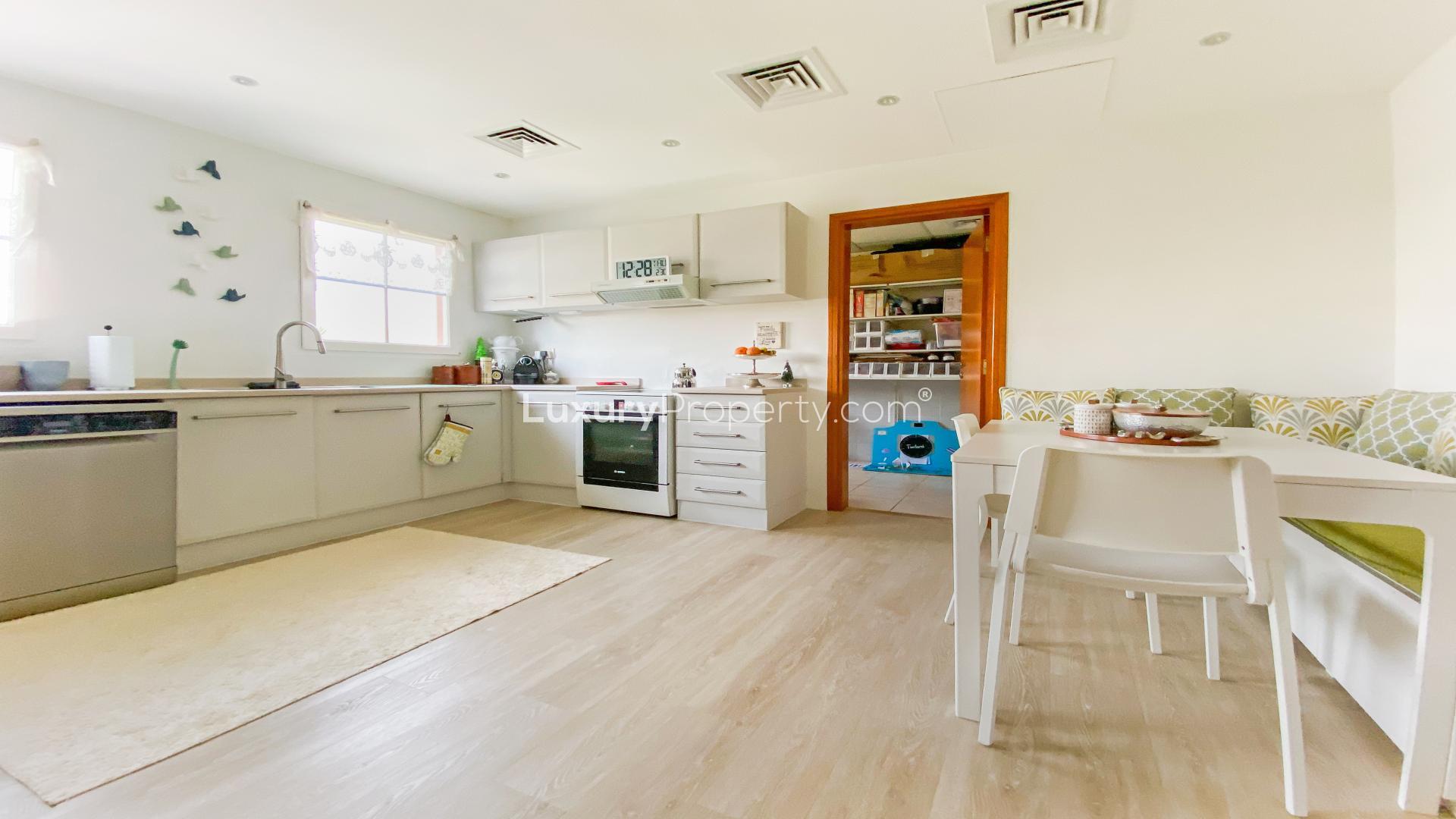 Modern kitchen in upgraded 2-bedroom apartment, Garden West, Green Community, for sale