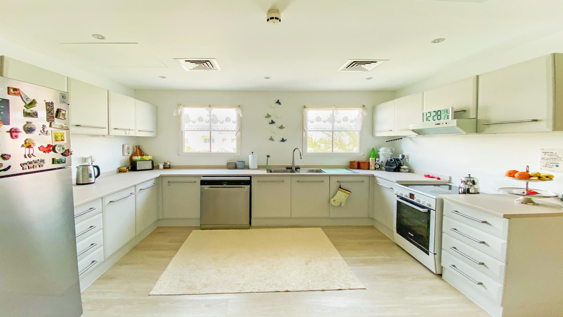 Living room with elegant decor in Garden West Apartments, Green Community, two-bedroom apartment for sale