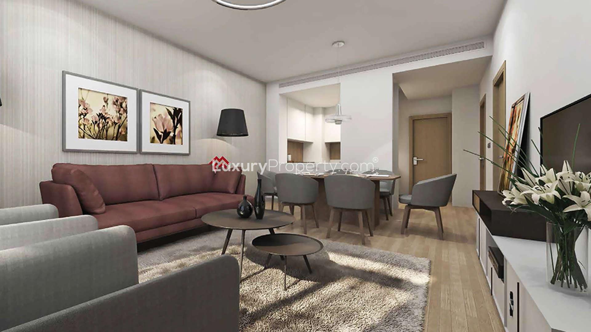 "Modern Genesis by Meraki apartment exterior in Arjan, Al Barsha South with palm trees.",Contemporary living room in 2-bedroom apartment, Genesis, Arjan, Al Barsha South for sale