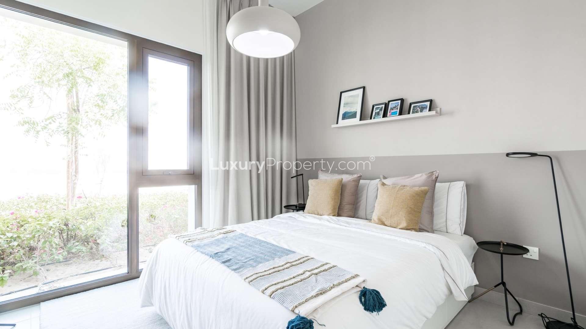 Modern kitchen in luxurious 2-bedroom apartment, Golf Views, Emaar South, with sleek appliances