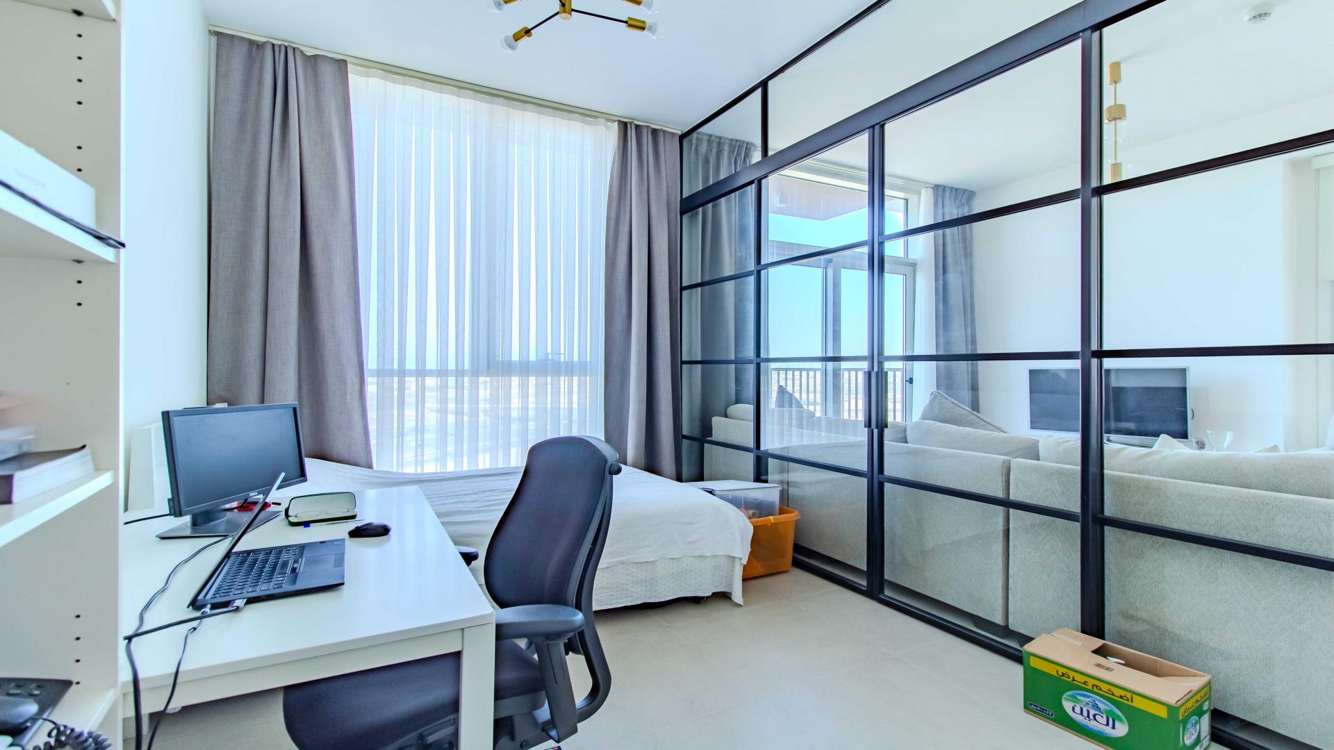 Modern kitchen in Dubai Hills Estate apartment, Collective 2.0, with stylish cabinetry and appliances