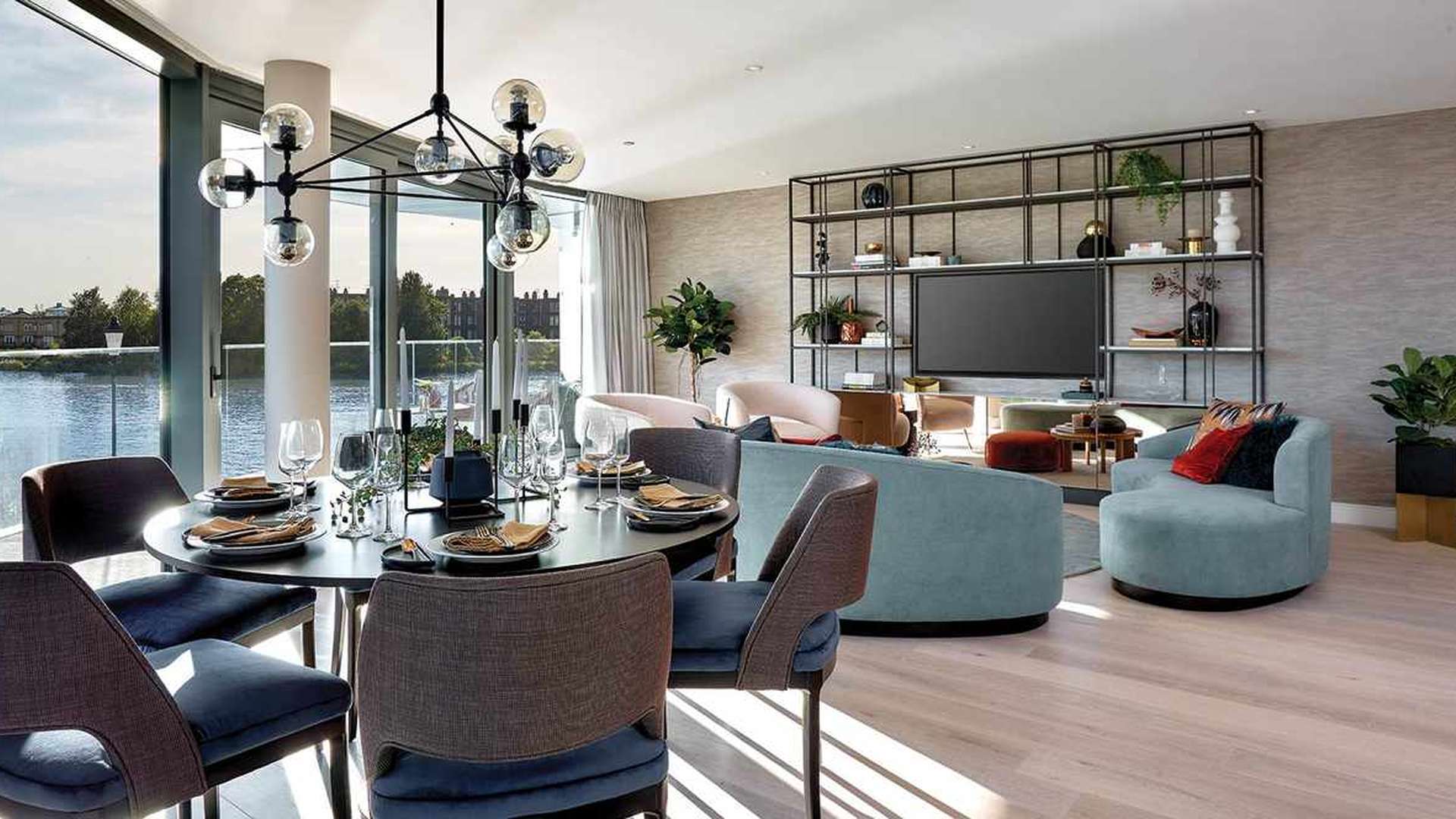 Modern open-plan kitchen and dining area in Fulham Reach apartment, Hammersmith, London