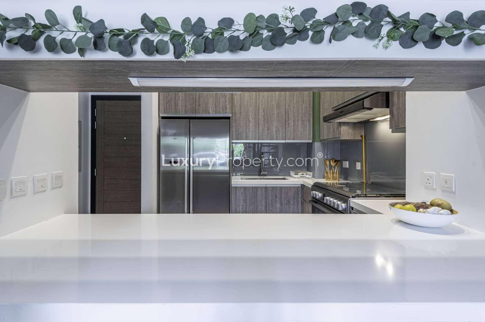 Modern kitchen with breakfast bar in lofted 2-bedroom apartment, Hyati Residence, Jumeirah Village Circle