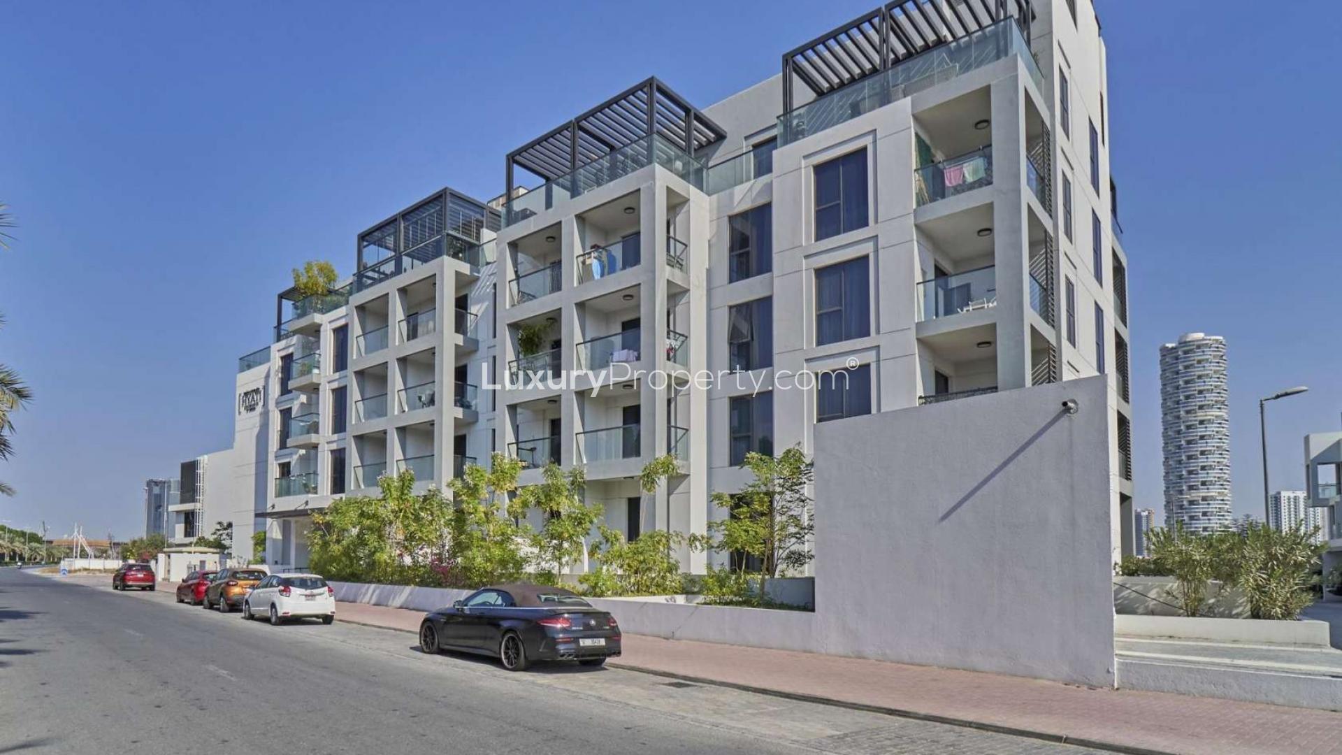 Luxurious bedroom in Hyati Residences apartment with large window and modern decor