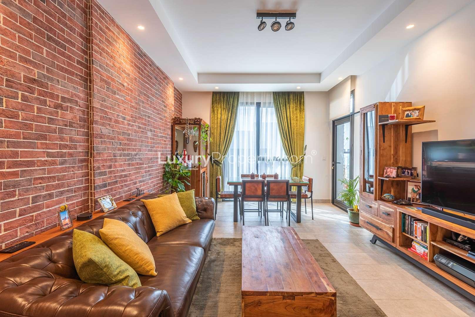 Cozy balcony with seating and plants in Hyati Residences, Jumeirah Village Circle apartment