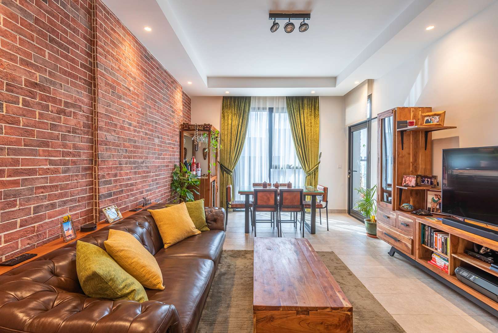 Cozy balcony with seating and plants in Hyati Residences, Jumeirah Village Circle apartment