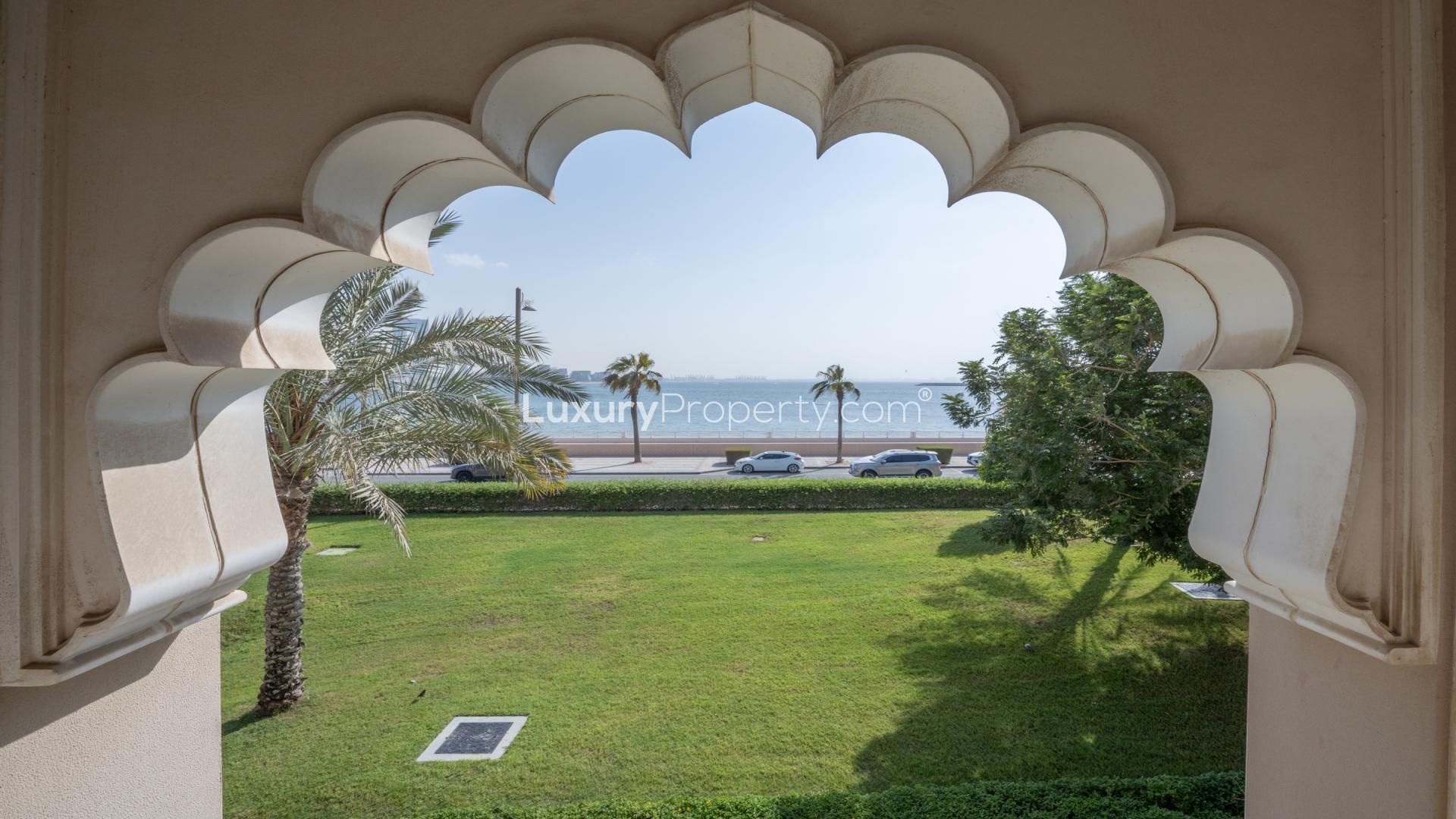 N/A,Seafront view from Maurya apartment in Palm Jumeirah's Grandeur Residences, lush greenery, ocean