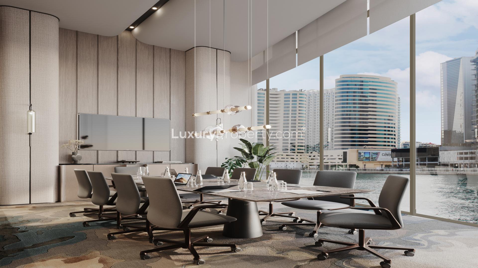 Beautiful Jumeirah Living apartment exterior with stunning Business Bay skyline view at sunset