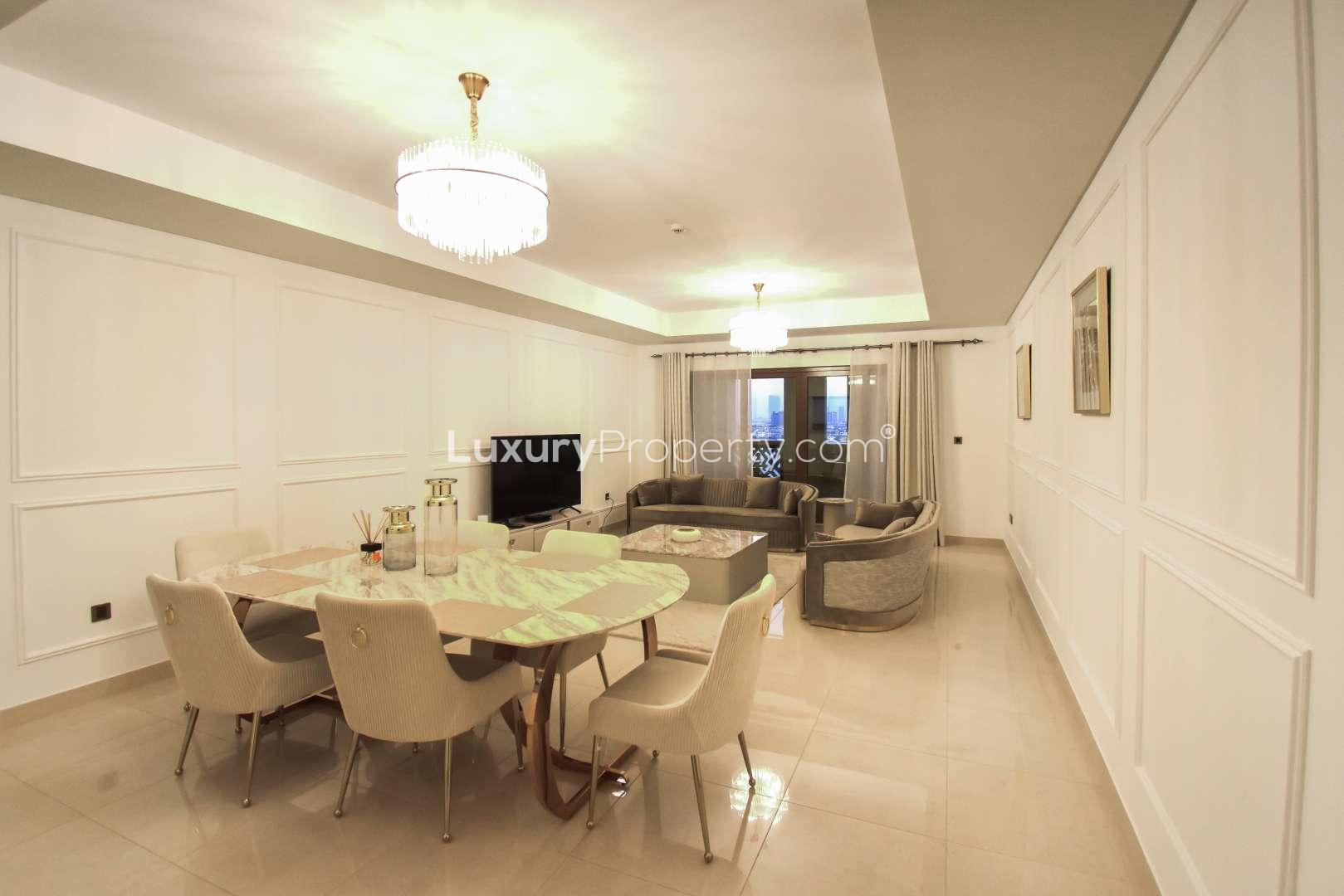 High-floor Palm Jumeirah apartment living room with elegant dining area and modern decor
