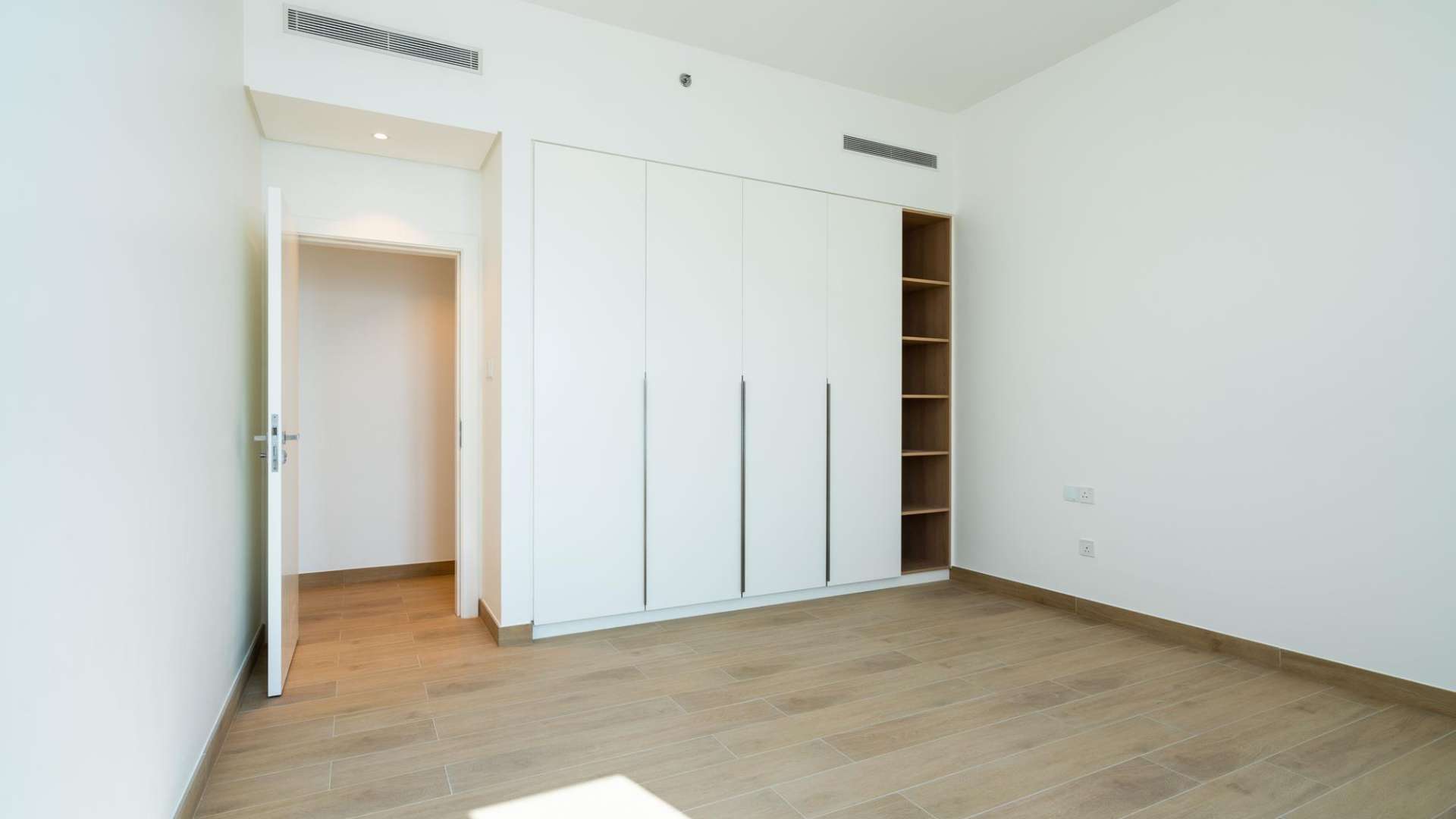 La Mer Jumeirah apartment exterior with lush landscaping and modern architecture