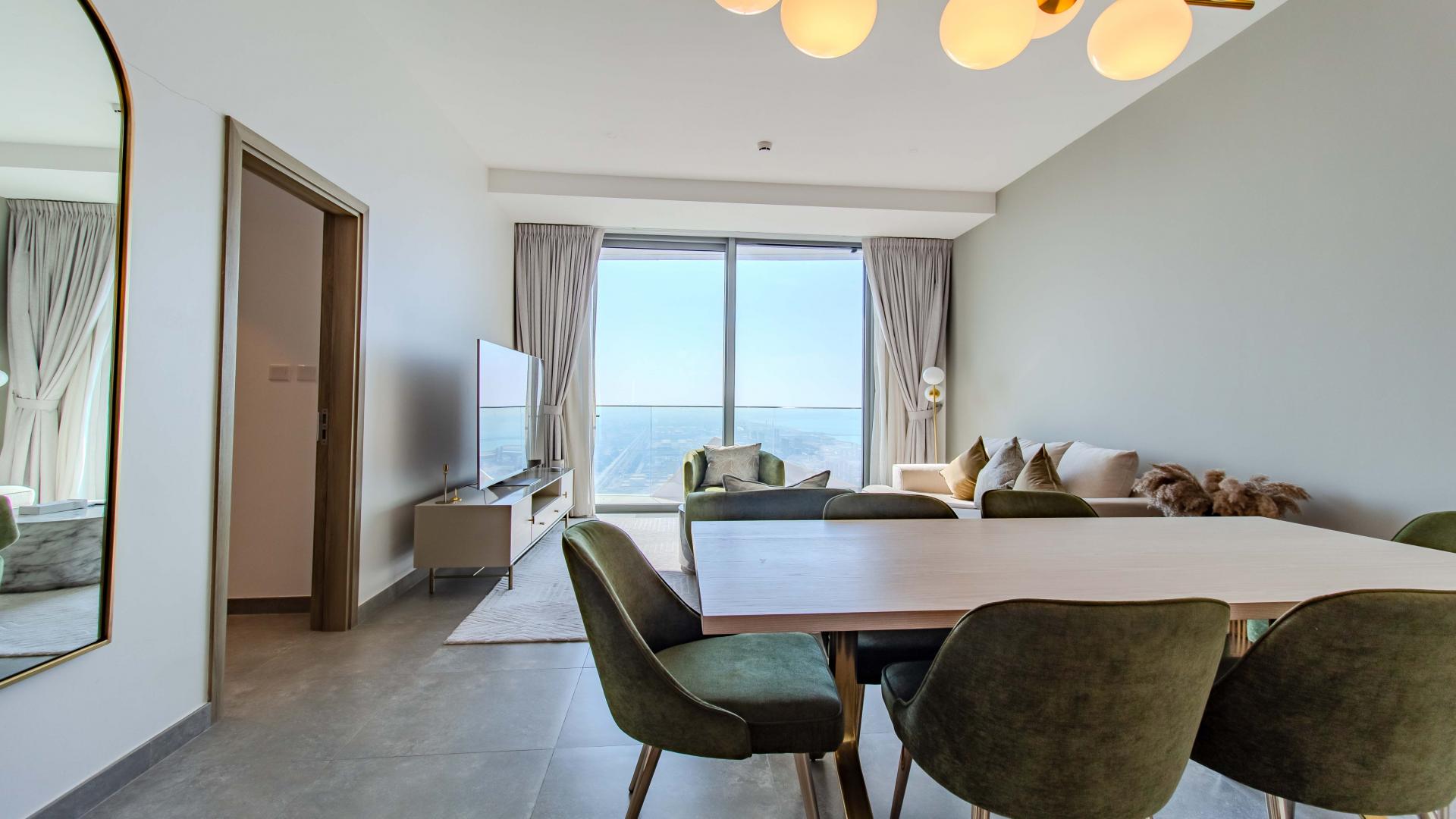 High-floor Stella Maris apartment balcony with panoramic Dubai Marina skyline view