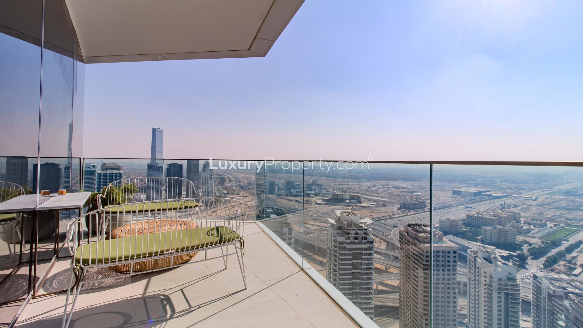 High-floor Stella Maris apartment living room with modern furnishings, Dubai Marina view