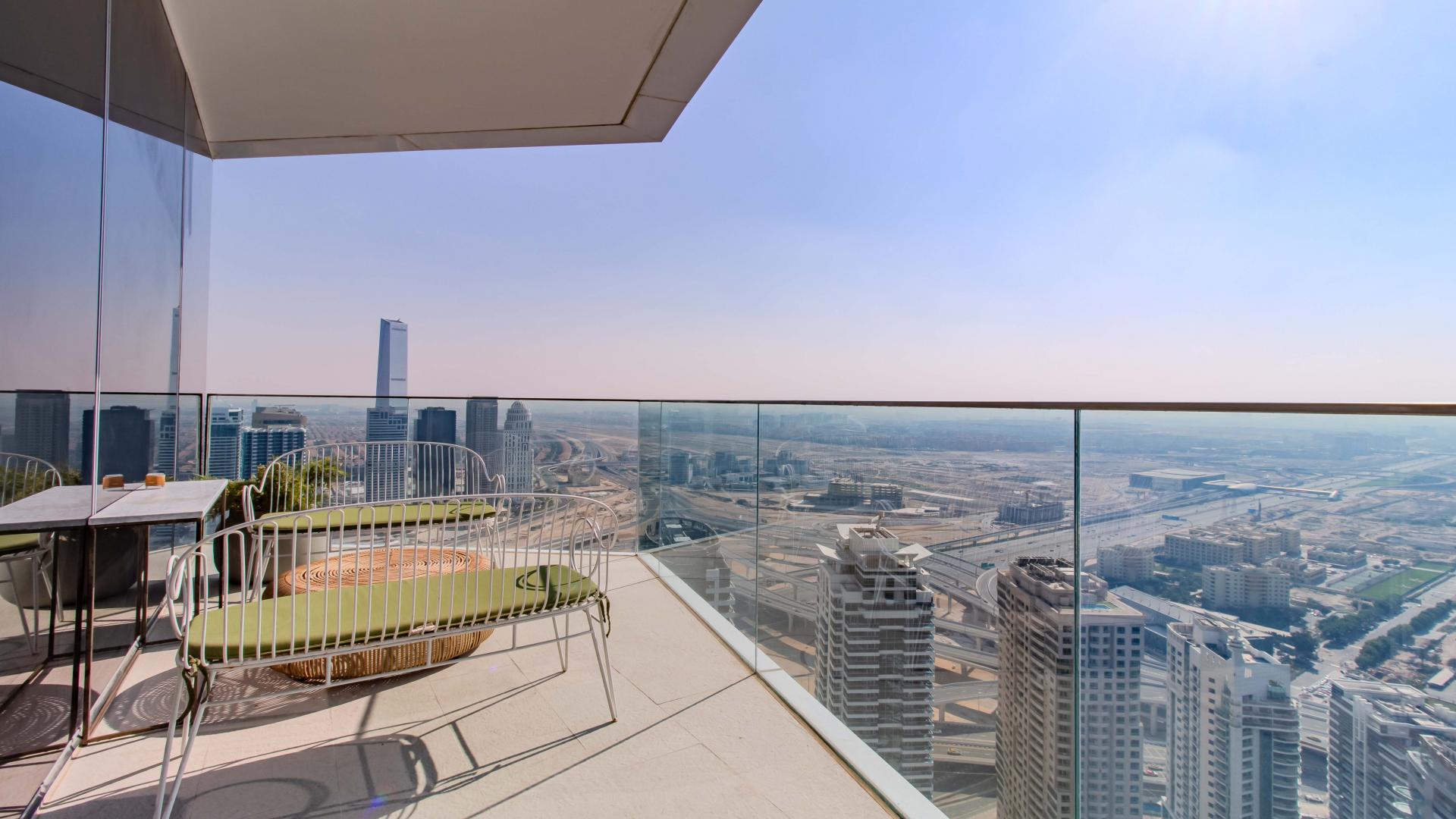 High-floor Stella Maris apartment living room with modern furnishings, Dubai Marina view