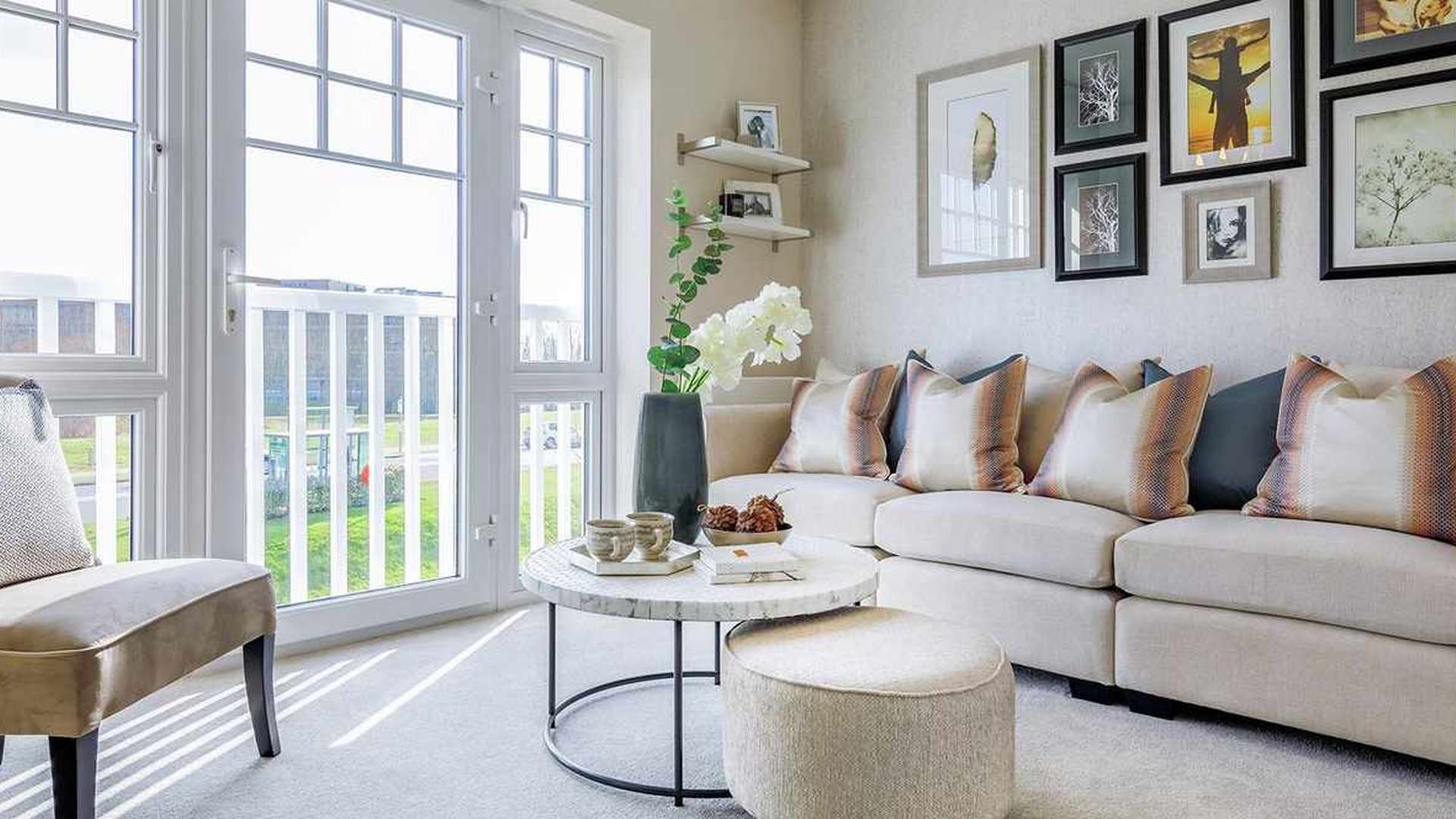 Two-bedroom Lakeside Gardens apartment living room with patio view, Green Park Village Berkshire