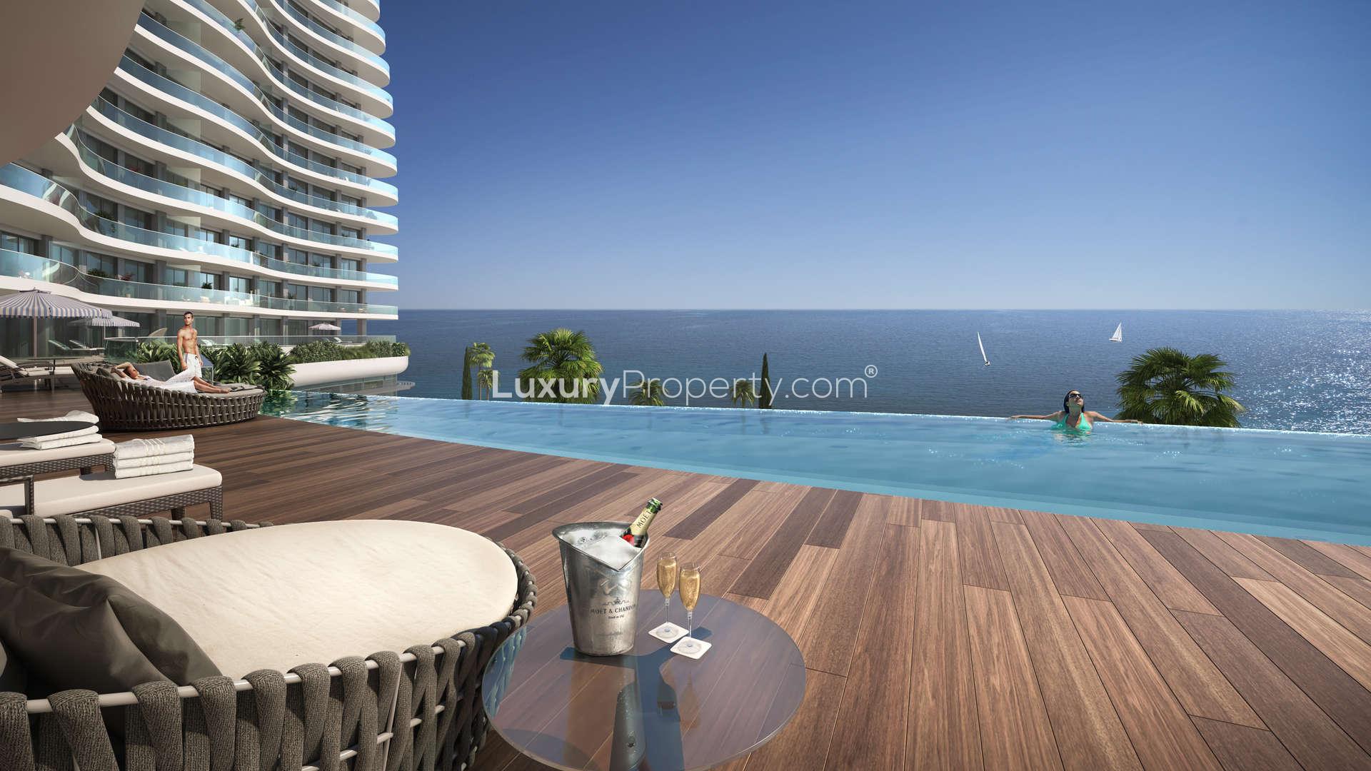 "Stunning sea view from Limassol Del Mar apartment balcony, Cyprus real estate for sale.",Infinity pool with sea view at Limassol Del Mar apartment, Cyprus for sale