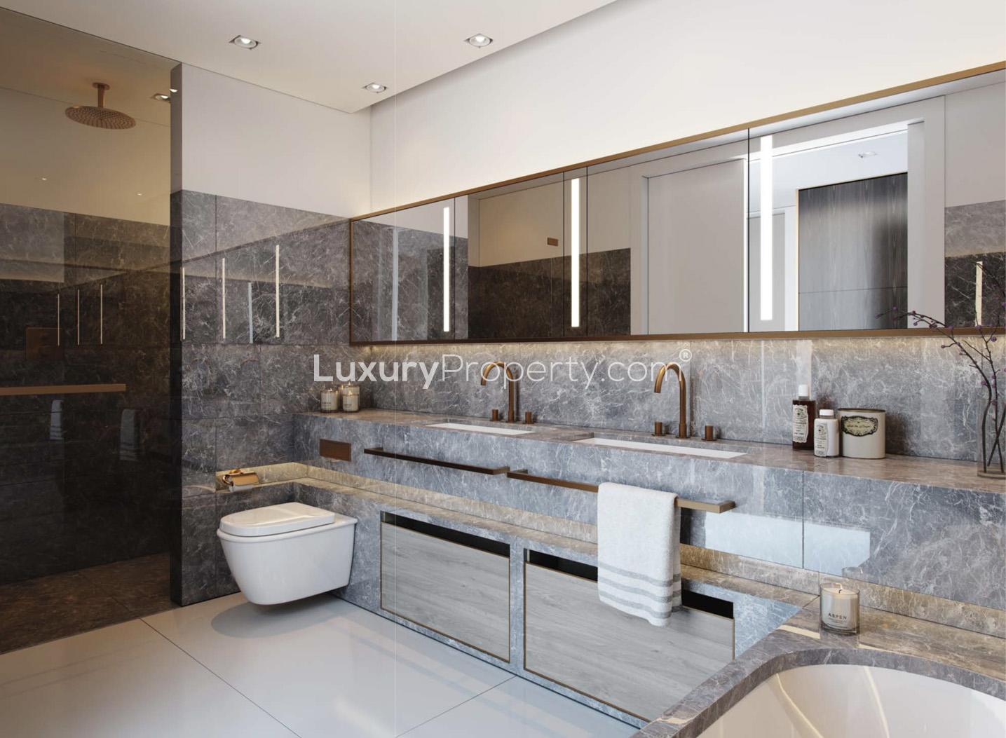 Luxurious bedroom in 2-bedroom apartment at Lincoln Square, London with elegant decor and view