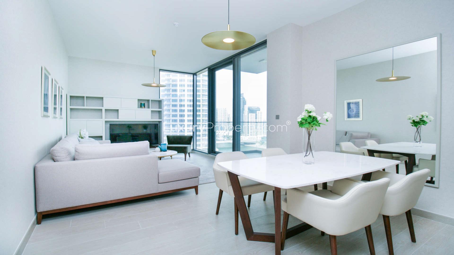 Modern open-plan kitchen and living area in Dubai Marina apartment, LIV Residence