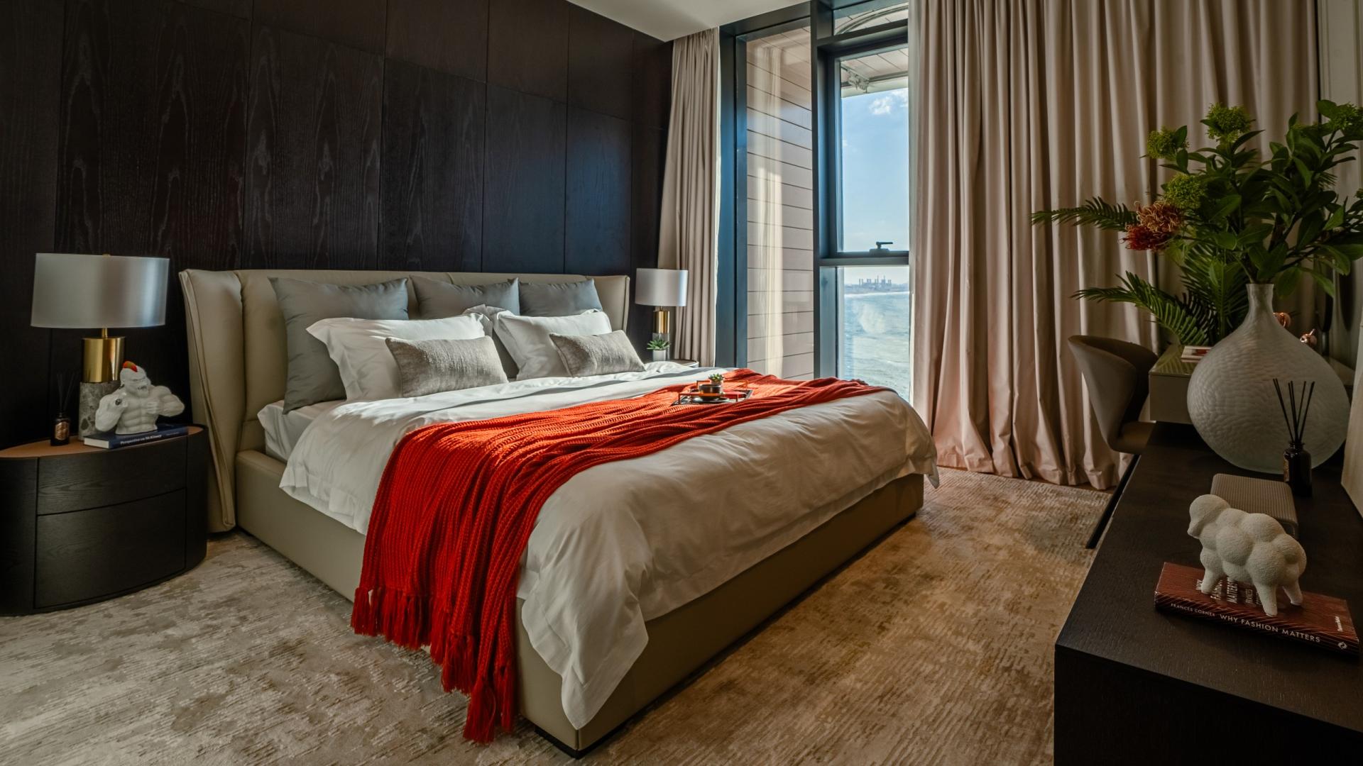 Modern living room and dining area in Bluewaters Residences apartment for sale