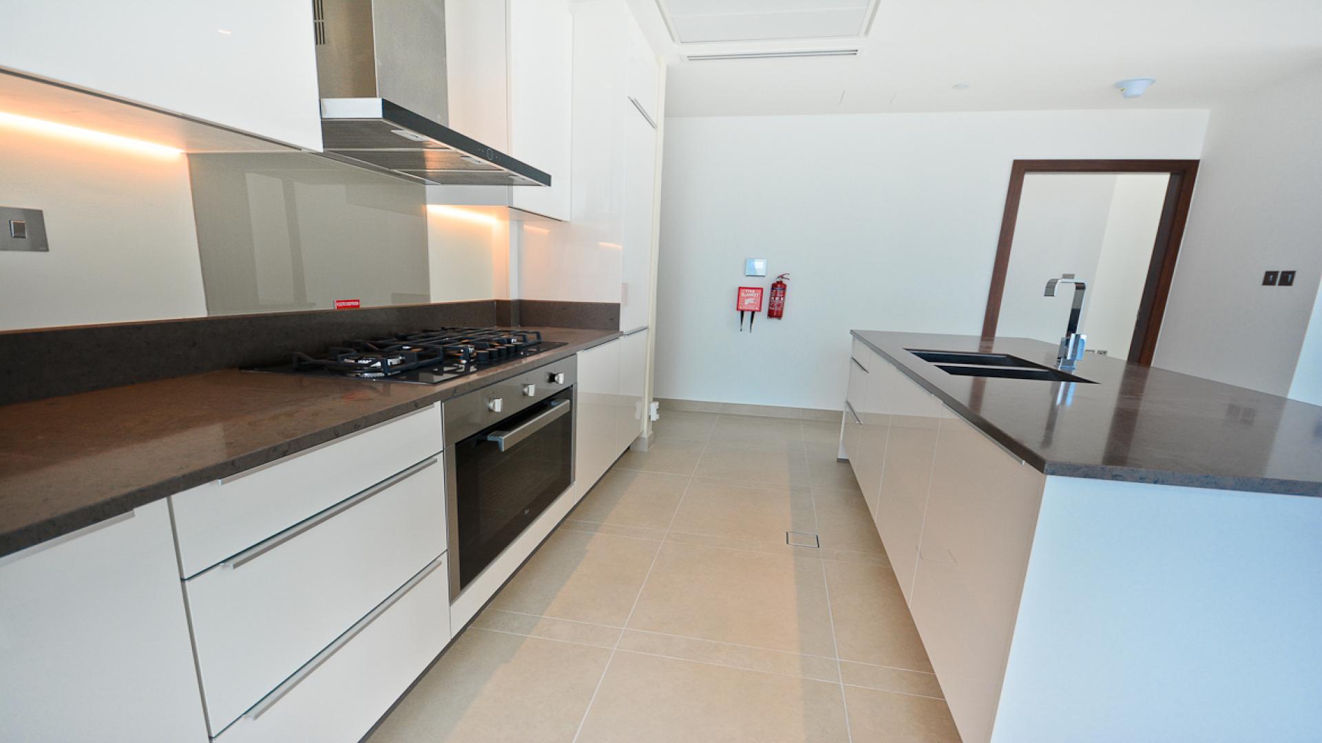 Luxurious kitchen in 2-bedroom Marina Gate Tower apartment, Dubai Marina, with stunning views