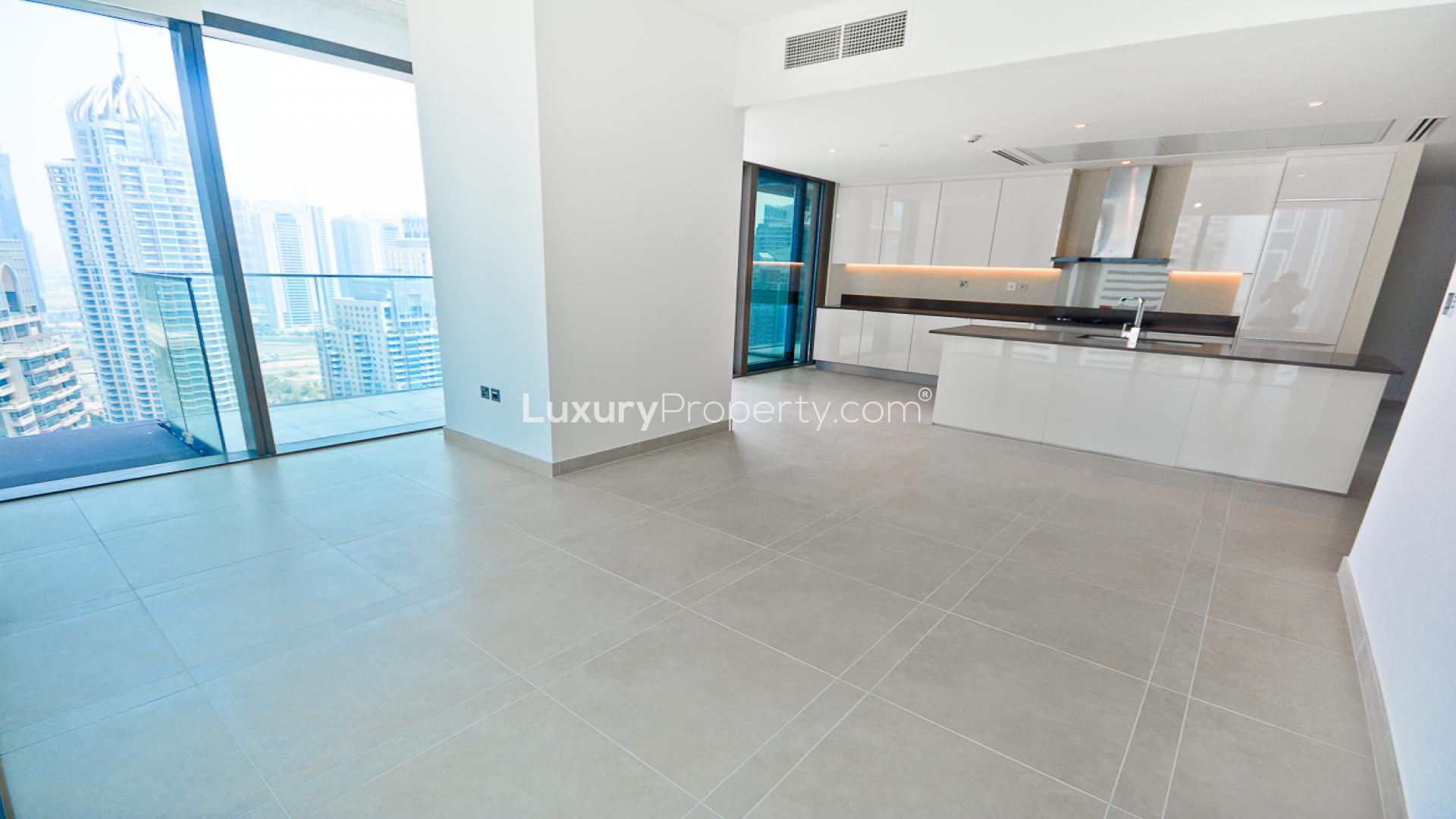 Luxurious Marina Gate apartment balcony view of Dubai Marina skyline and waterfront