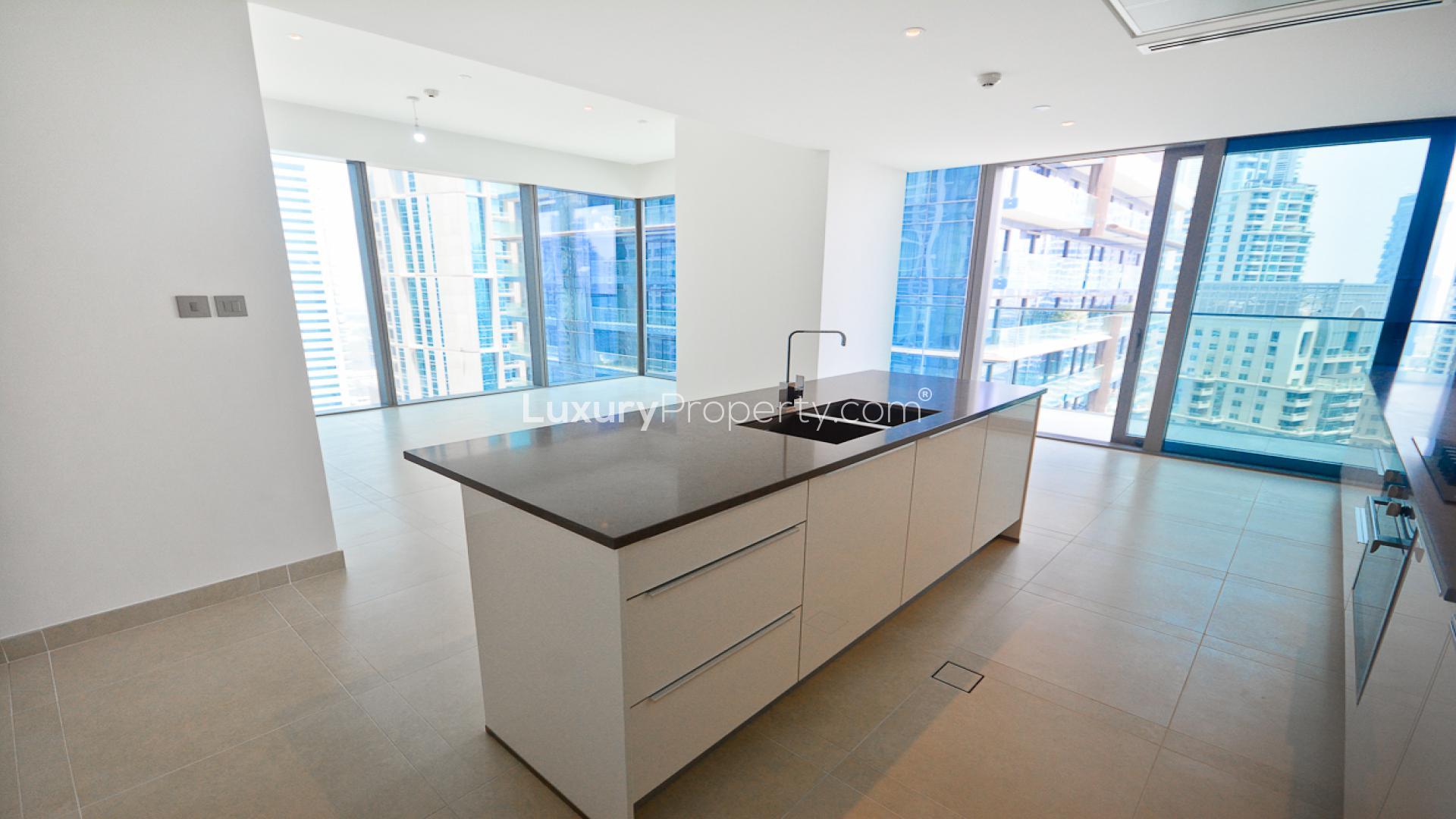 Luxurious open-plan kitchen and living area in Marina Gate Tower apartment, Dubai Marina